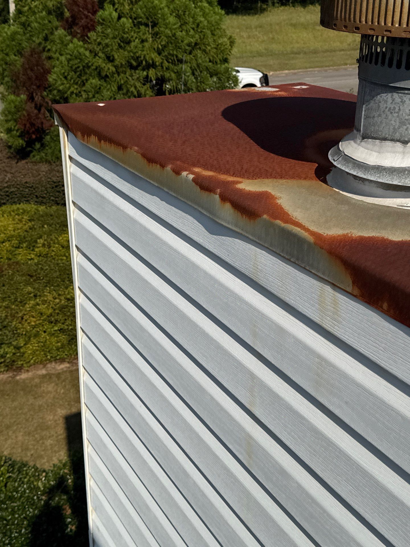 Chimney Pan and Pipe Boot Repair in Hueytown by The Roofing Dudes