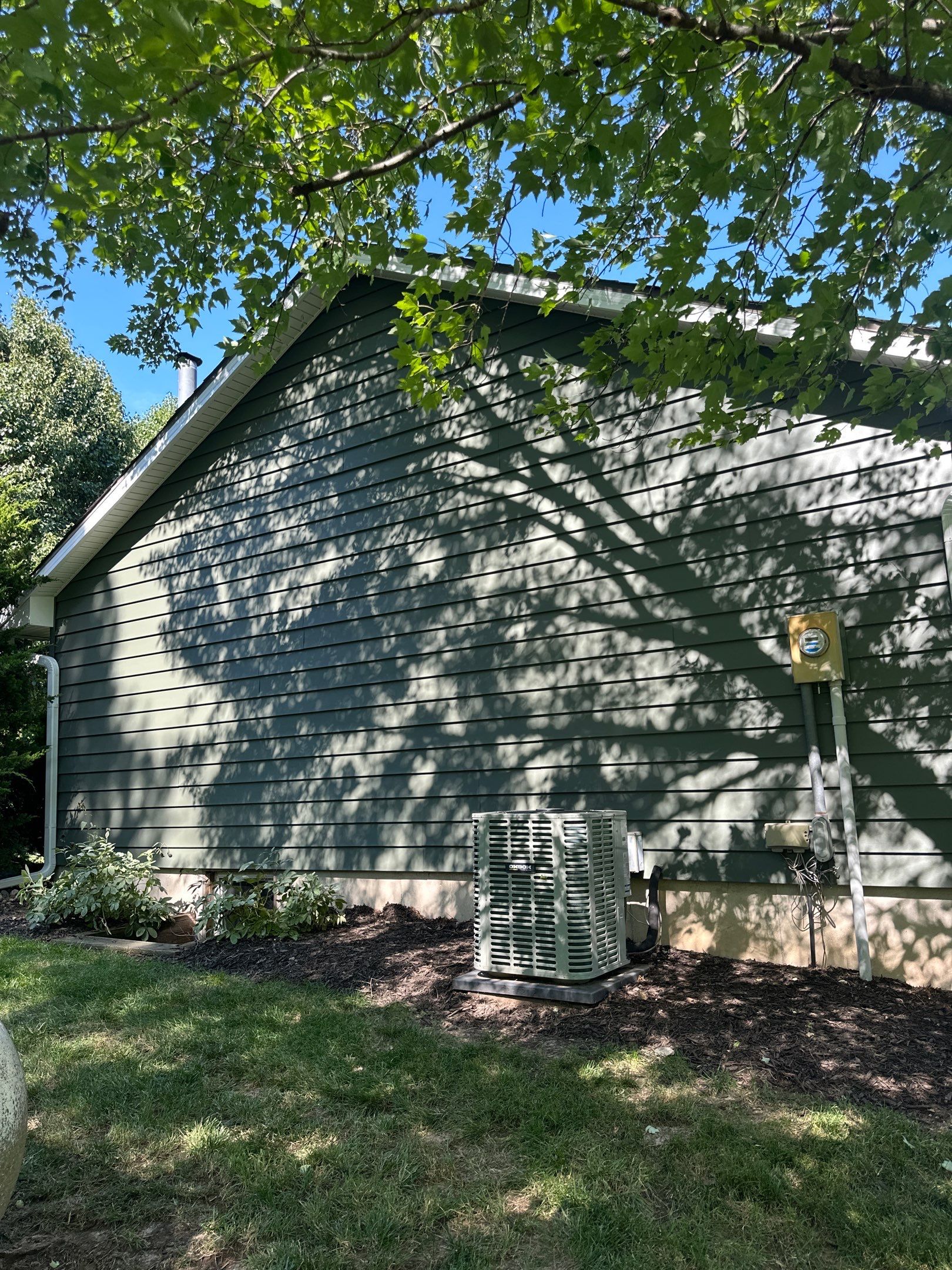New Craneboard Siding on this Platte City, Mo home  by EEC  Windows, Siding & Roofing 