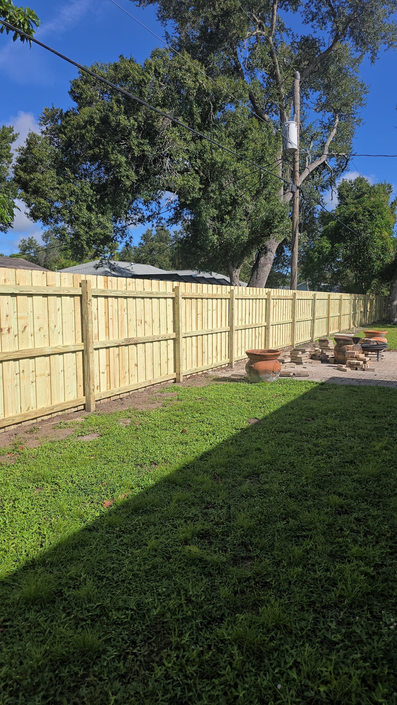 Pressure-Treated Wood Privacy Fence and Gate Installation in North Port by True Fence LLC