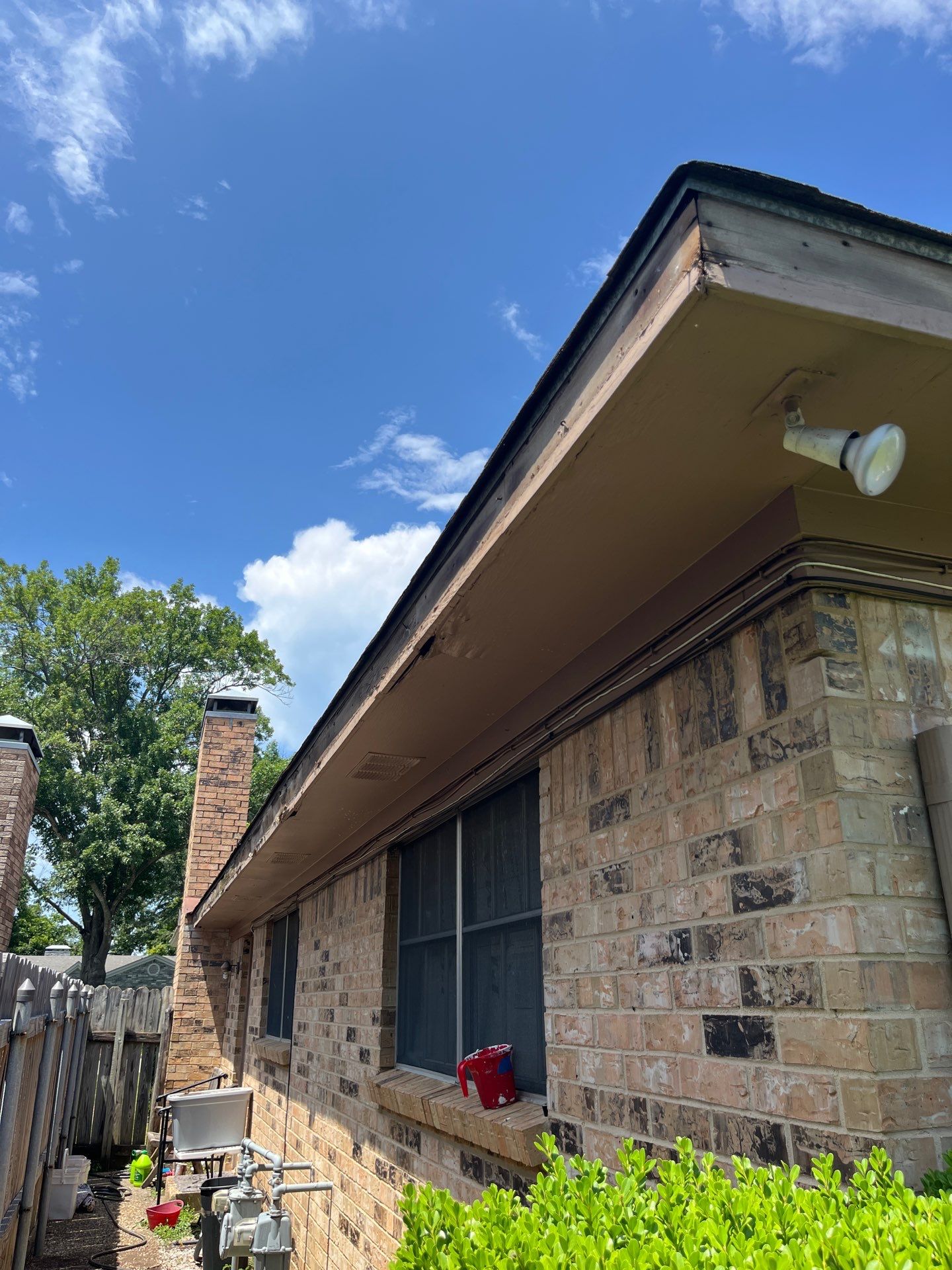 Exterior Painting in Tyler, TX | Eaves, Door & Columns in Elegant Black by Quality Coats Painting