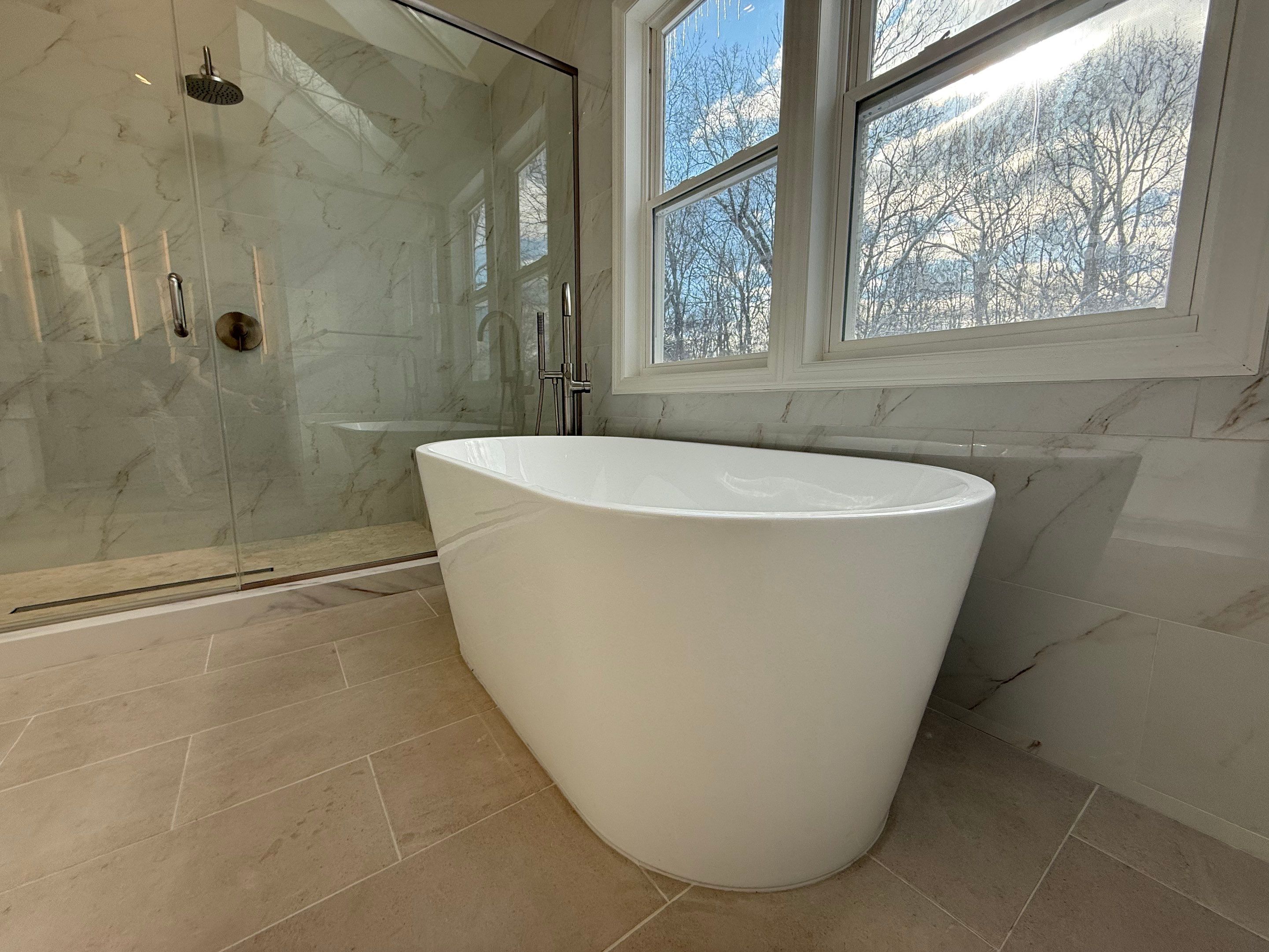 Bathroom Remodel using Tile by Home Concepts Construction