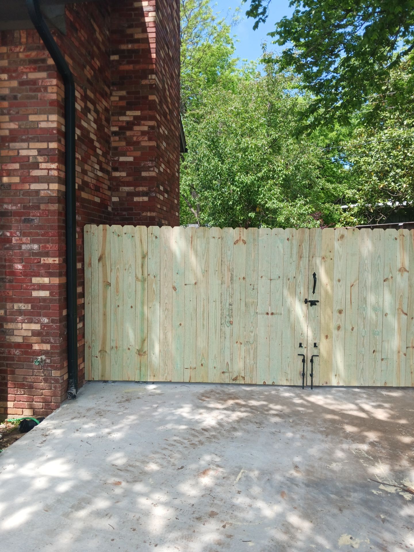 Concrete Driveway and Fence by Clays Services Inc
