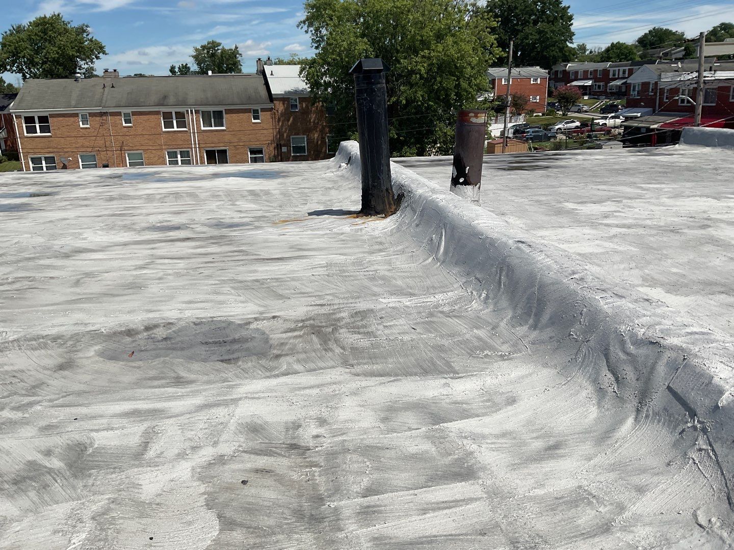 Residential Roofing Repair using Mule-Hide 221 Wet/Dry Roof Cement by Alpha Design Services
