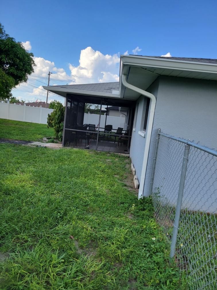 New Gutter System with Splash Guards in Cape Coral FL by Gutter Professors