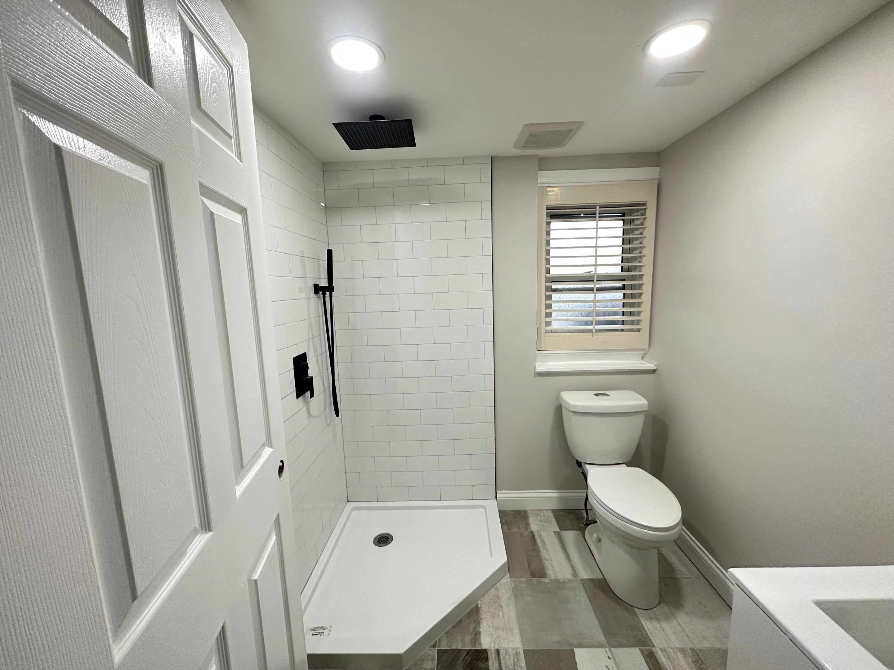 Bathroom Remodel using Cabinets by Home Concepts Construction