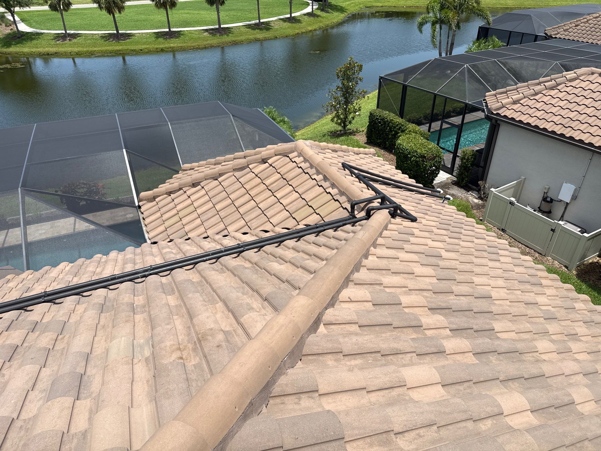 Neighboring Tile Roof Cleaning with Gutter Runoff Control – Palmetto, FL by Sunshine AquaWash