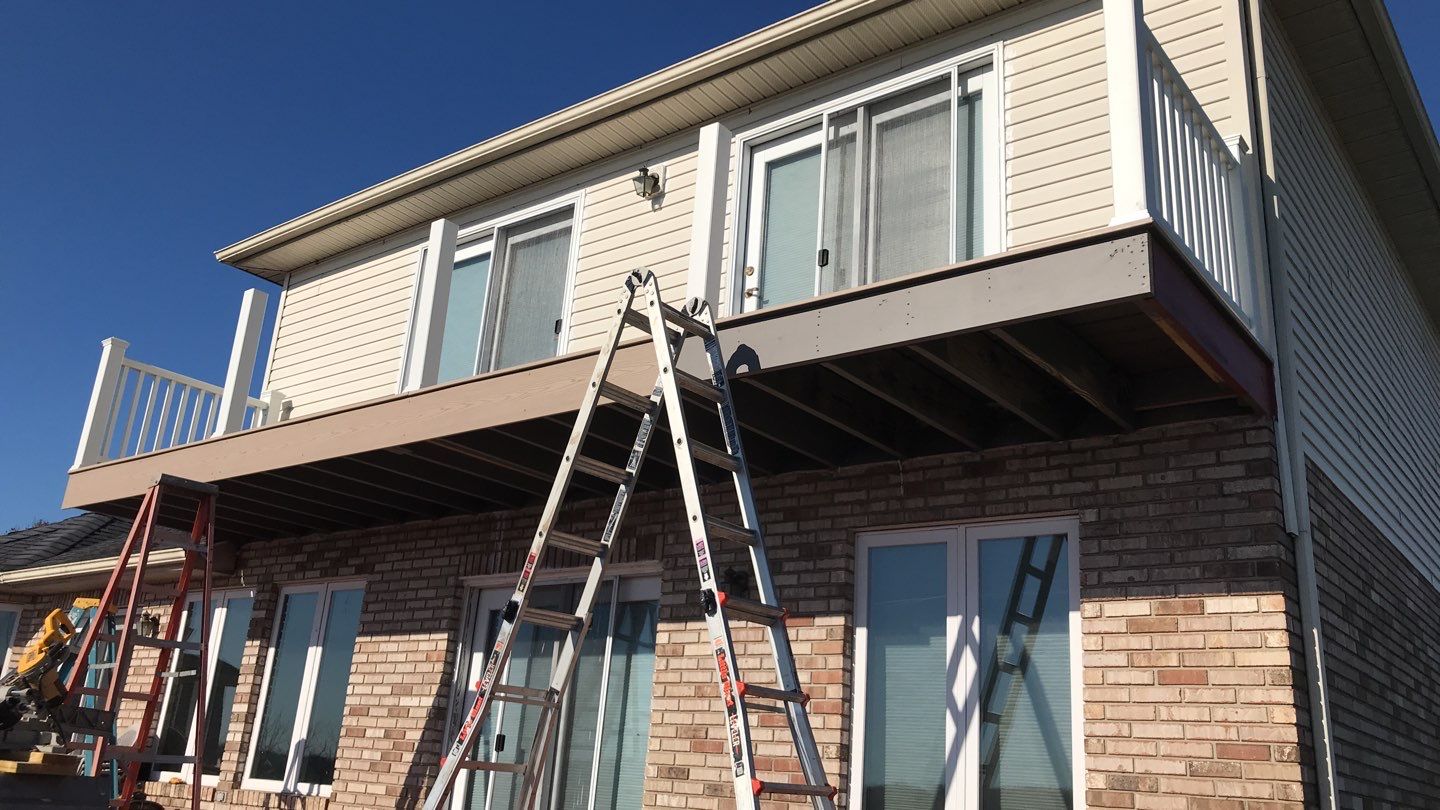 Deck Refurbush and Door Replacement using Trex Decking and Railing. Polaris Patio Doors by Secure Construction Company Inc