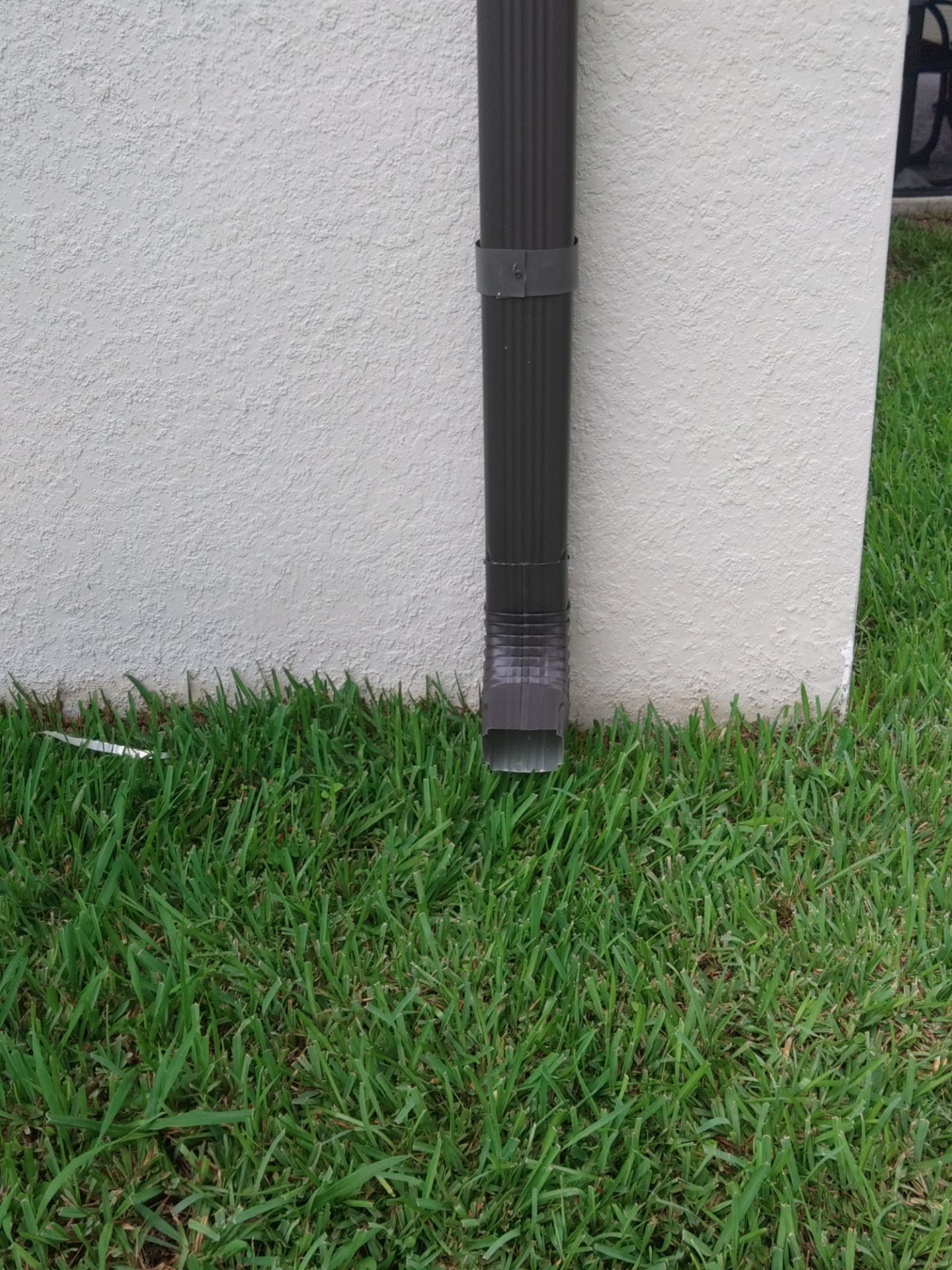 Black Seamless Gutters using black seamless gutters in Cape Coral FL by Gutter Professors