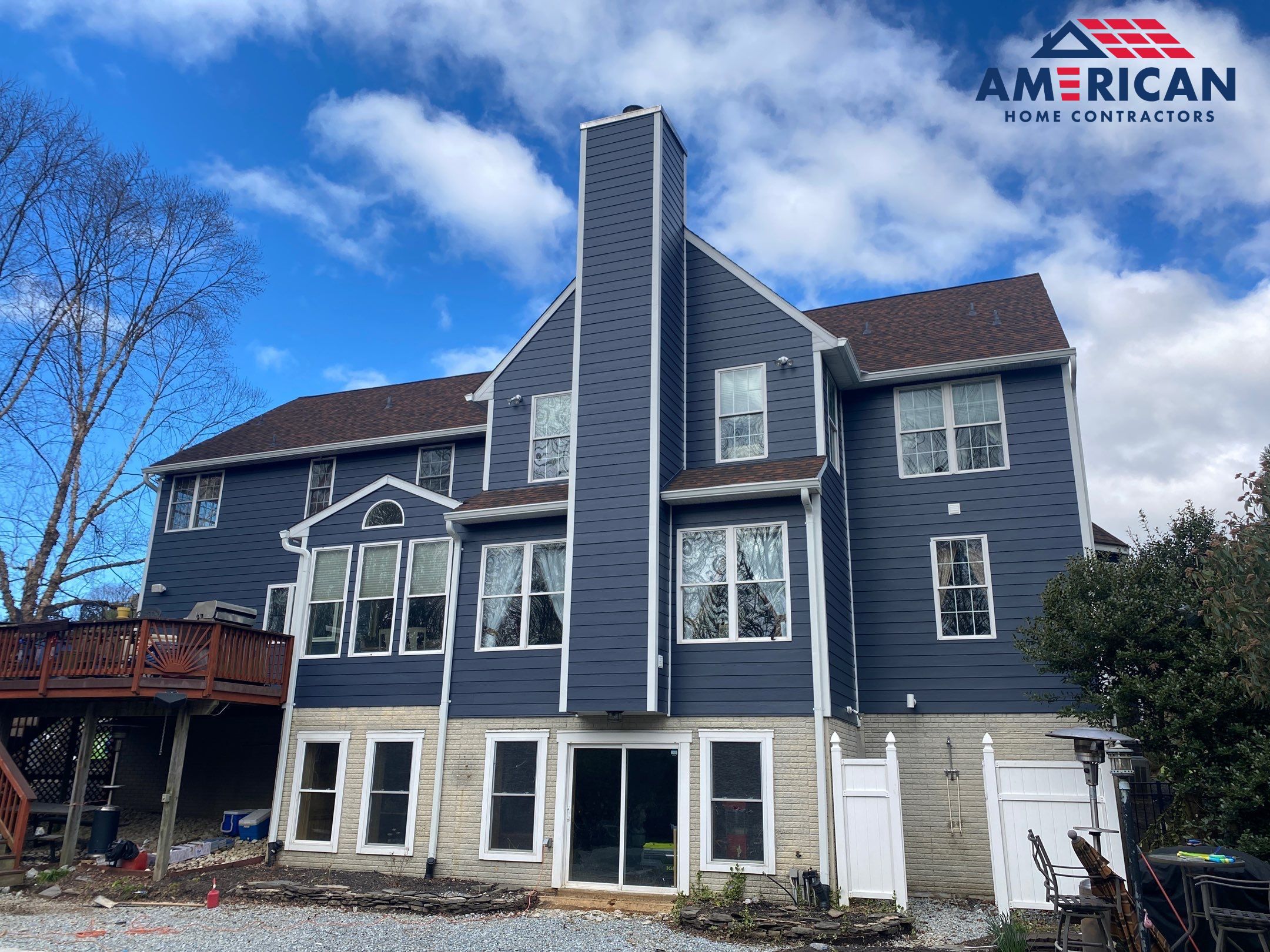 James Hardie Plank Siding + Seamless Gutters by American Home Contractors