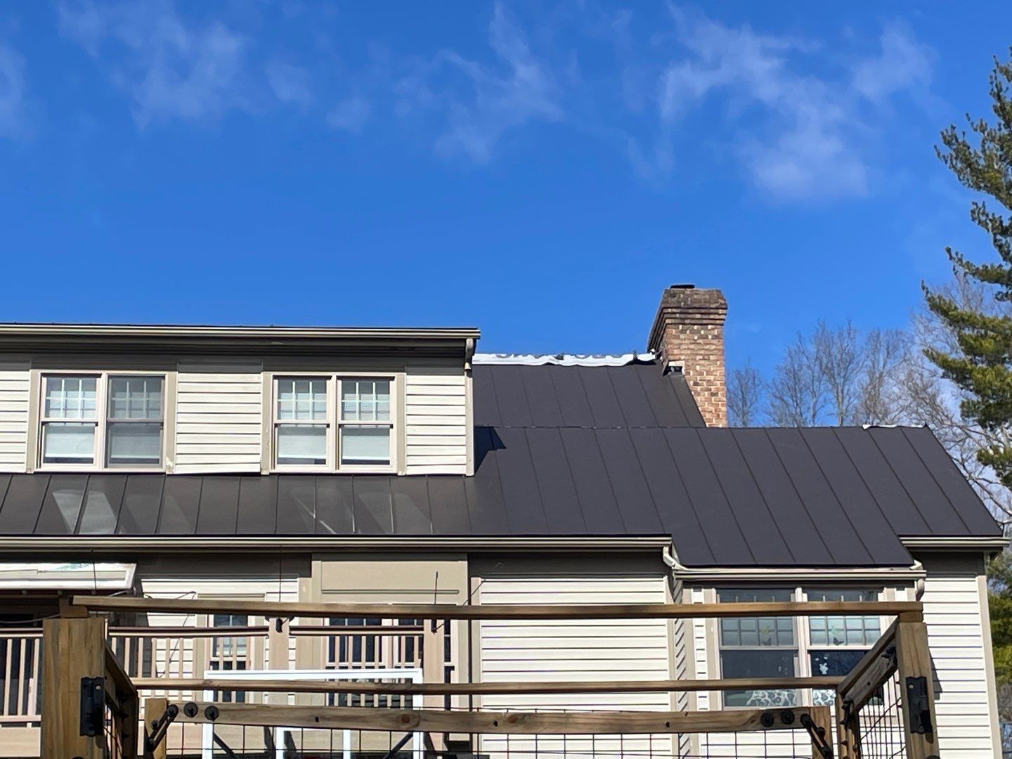 Metal Roof Replacement  by American Home Contractors
