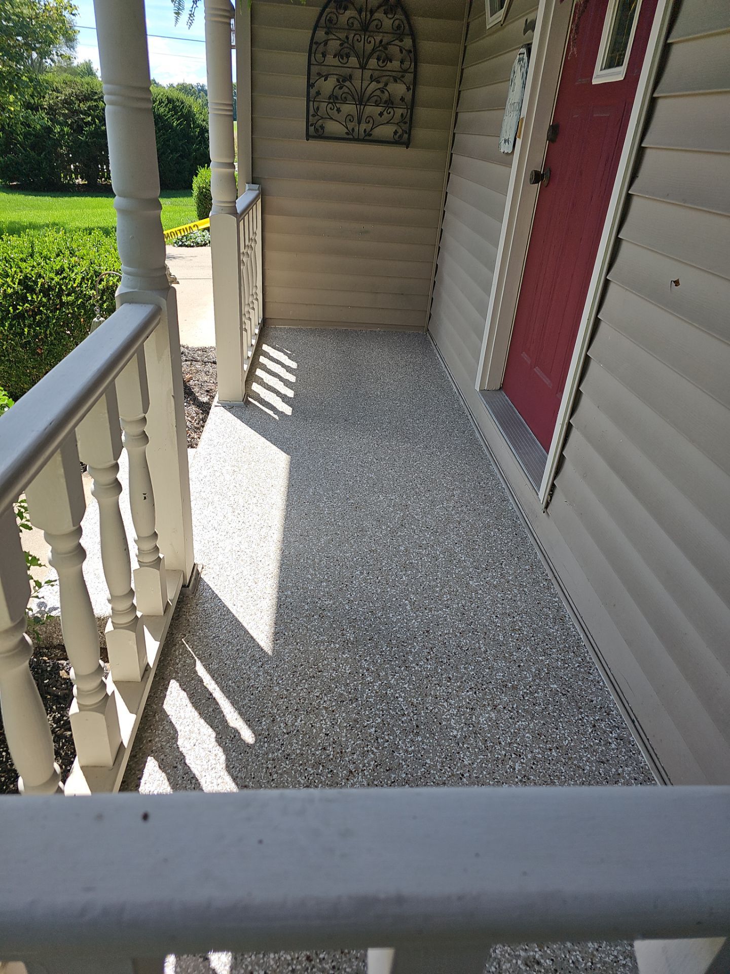 Garage and Porch Coating in Osceola by Innovative Spaces / Innovative Concrete Coatings