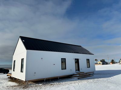 Residential Roofing Installation using Standing Seam Steel