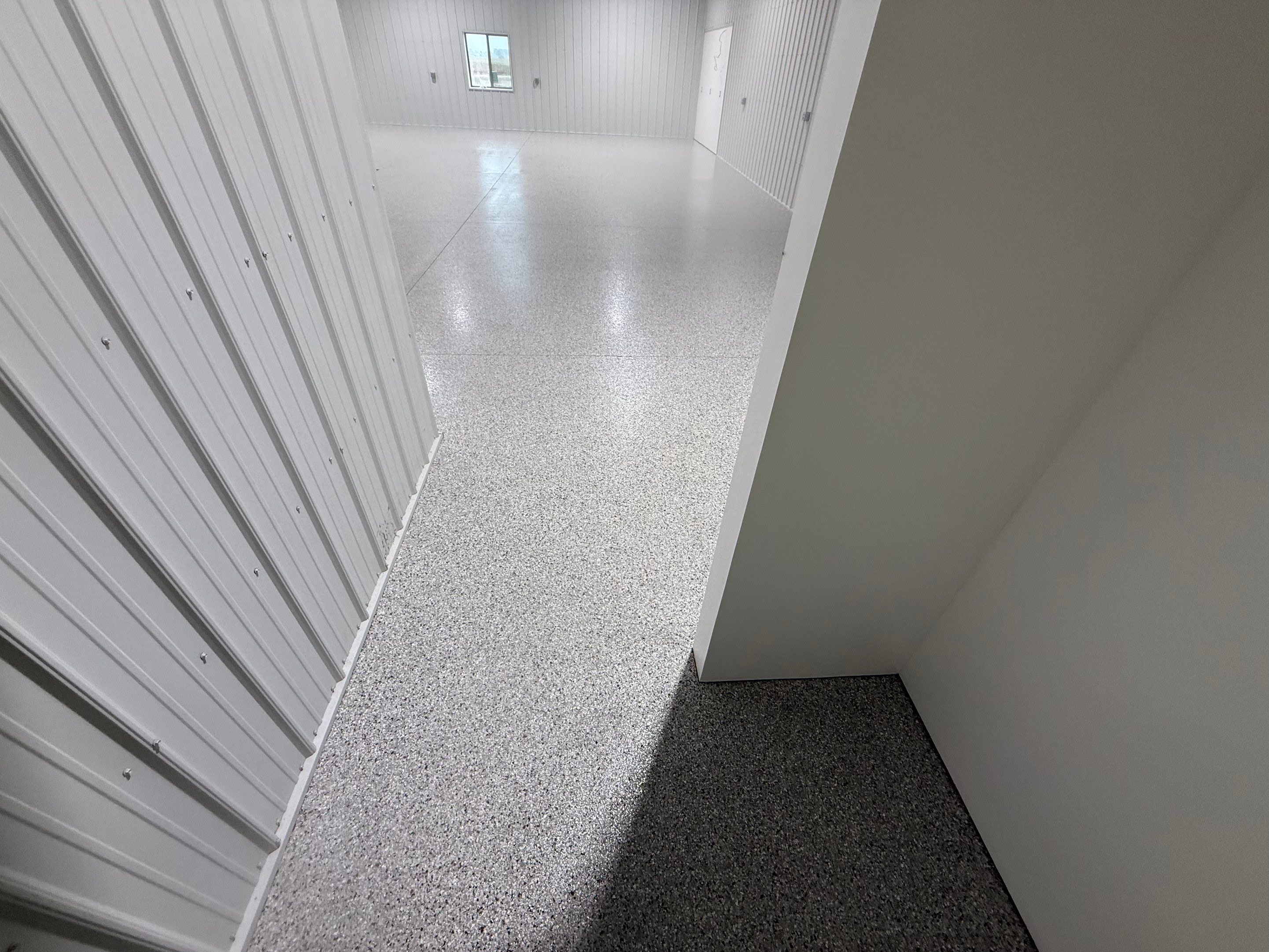 Custom Speckled Floor Coating for Large Montrose Shop by Select Painting, Coatings & Garage Cabinets