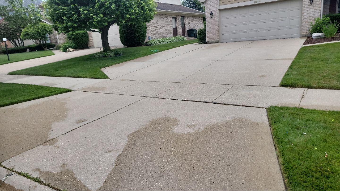 concrete power washing Algaecide, soft wash soap by Northern Power Washing LLC.