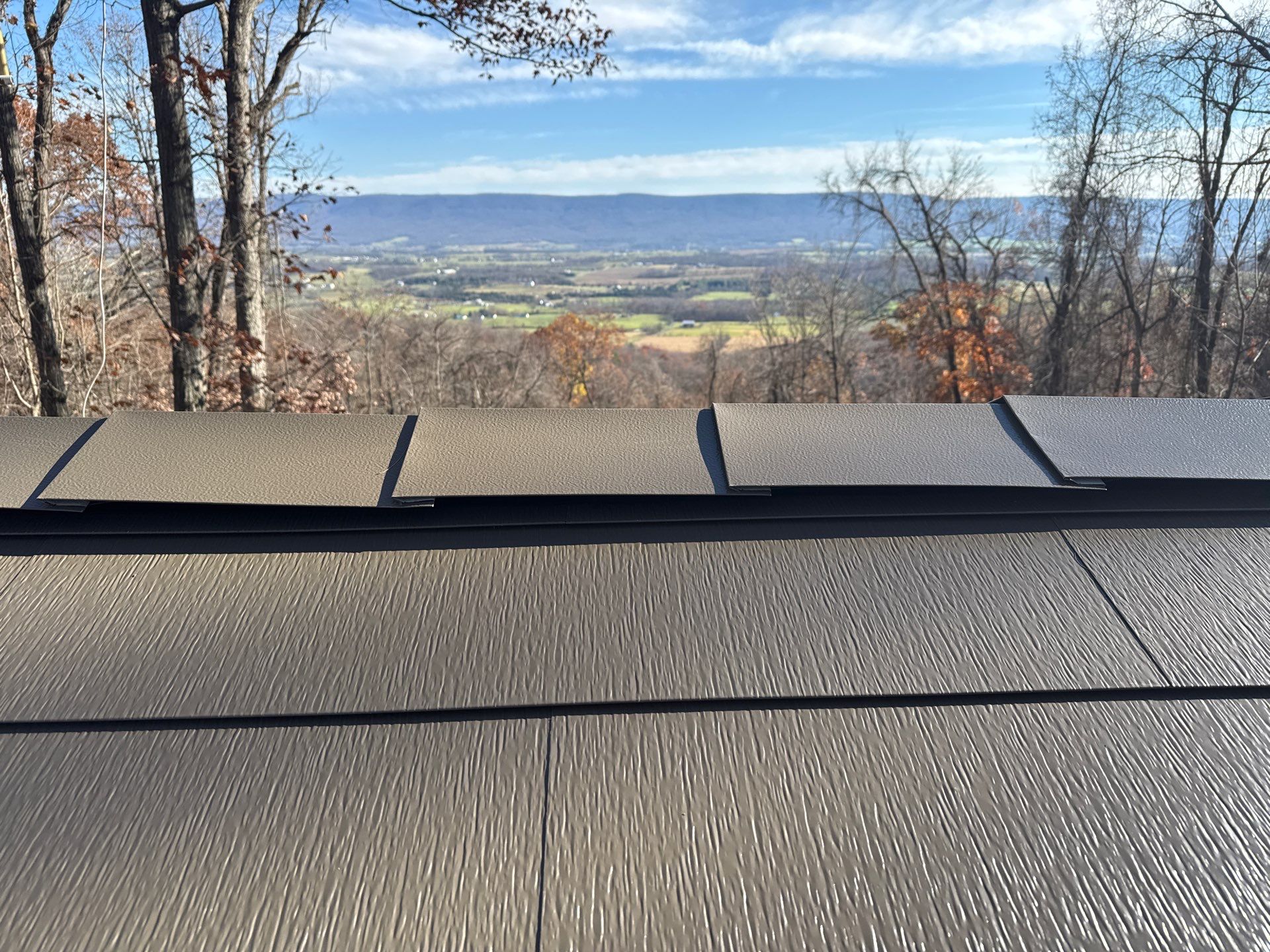 Roof replacement using GAF TimberSteel by American Home Contractors
