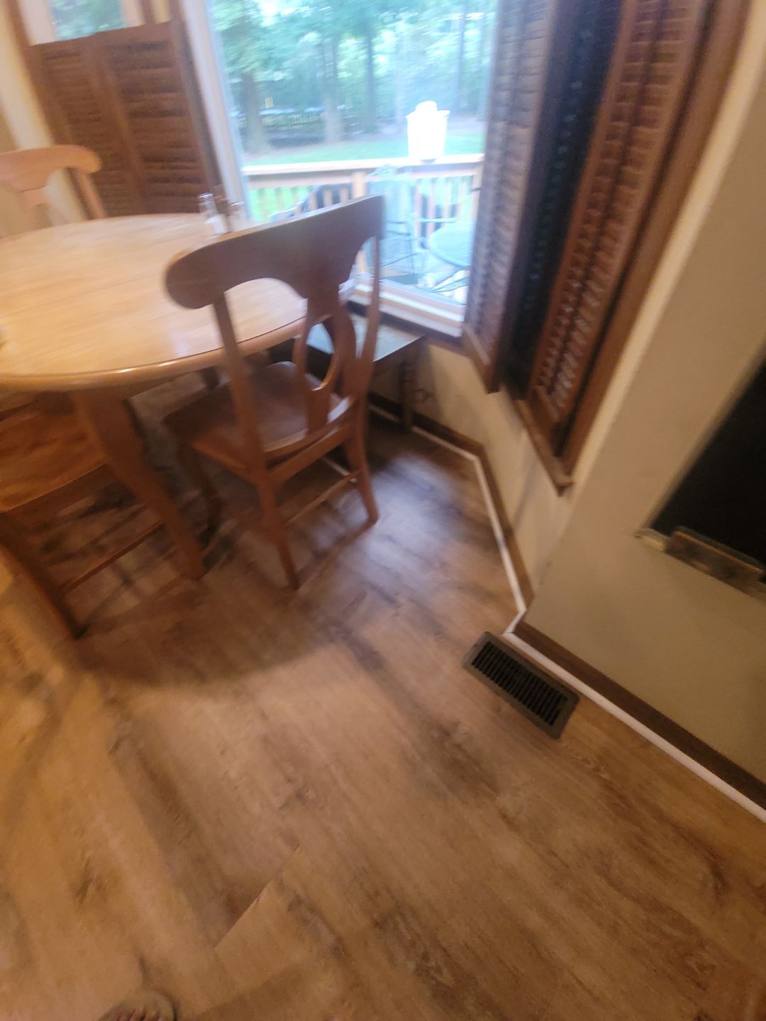 A Pathway to Personality – A Two-Tone Kitchen Transformation in Apex by Elite Remodeling and Design LLC
