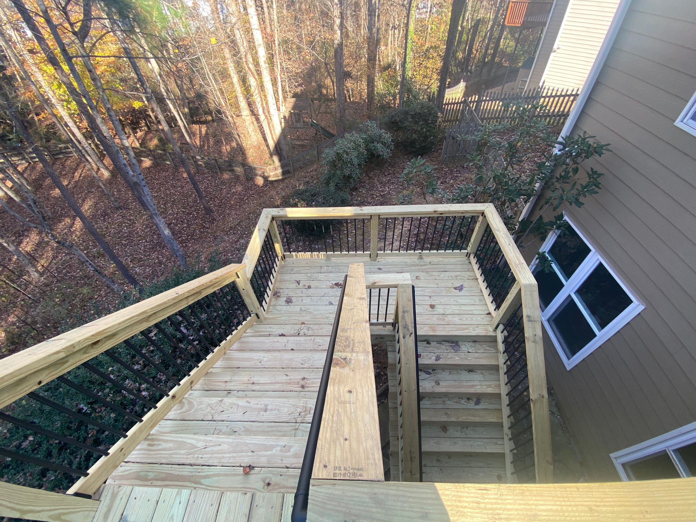 Elevated Wooden Deck and Staircase Construction in Cumming by Swift Home Renovations