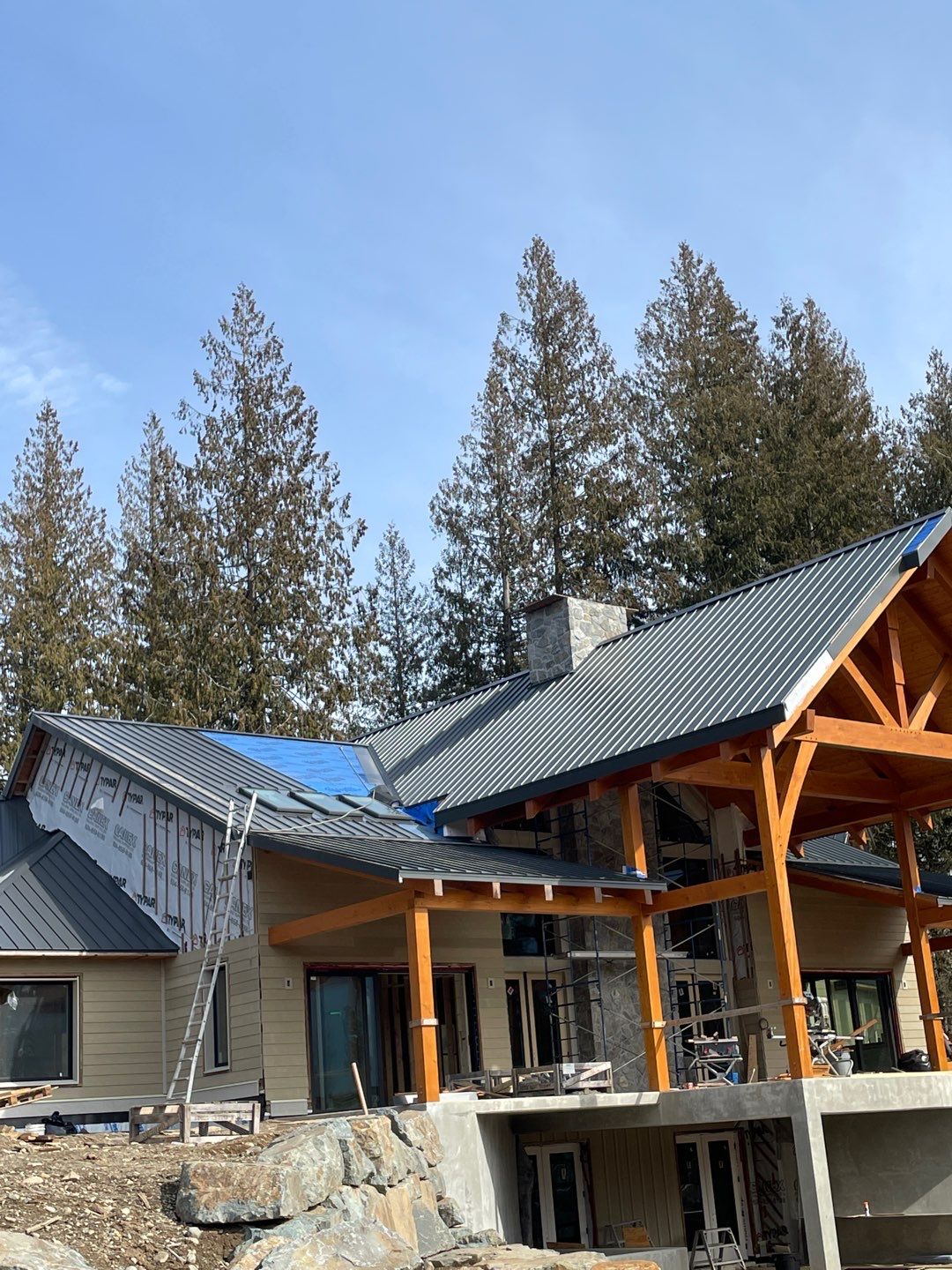 Residential Roofing Installation using 12" Prolok metal by Top Notch Roofing Inc