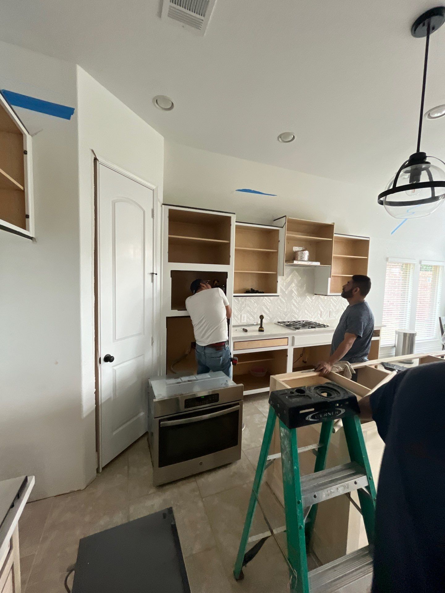 Kitchen Remodel using Water mitigation equipment by L&T General Contractors and Restoration INC