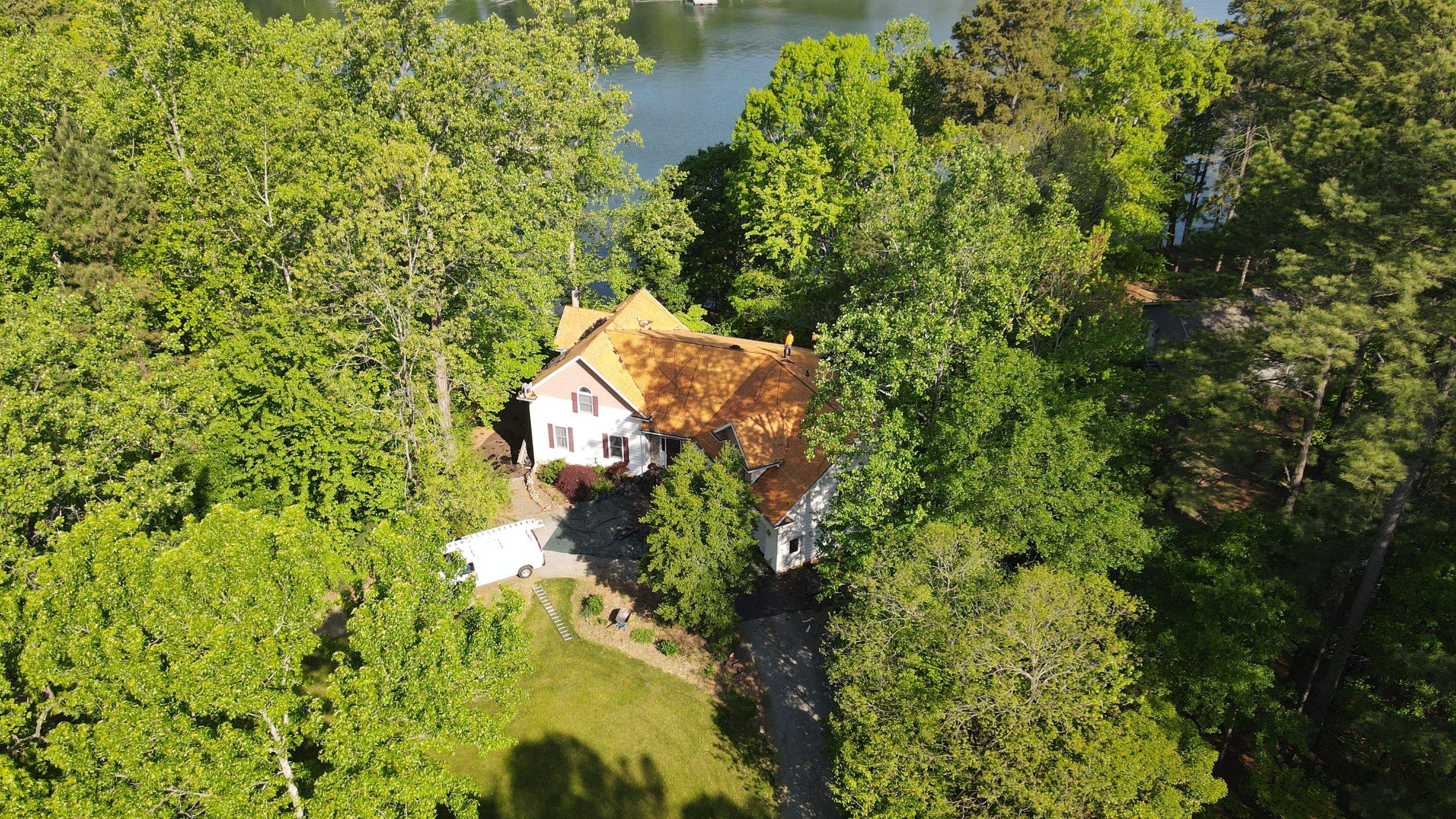 Residential Roofing Installation using  TAMKO Titan XT Rustic Redwood by RISE Roofing & Restoration, LLC