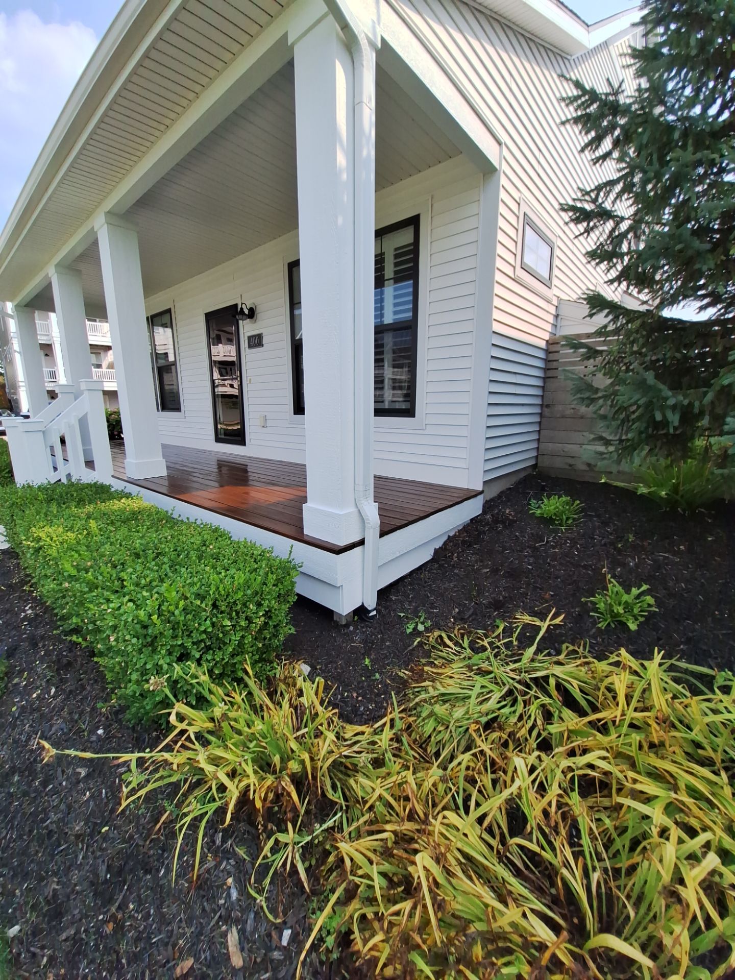 Freshly Stained Deck with Painted Railings by Gordon Painting
