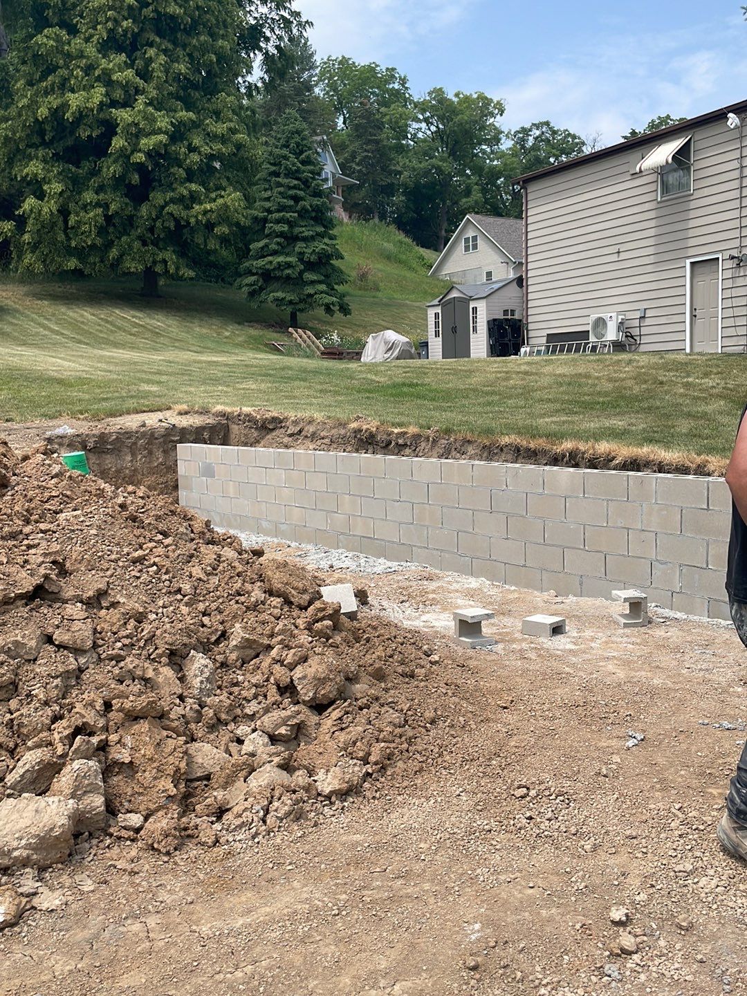 Fence / Retaining Wall using Block then parge by ACE Waterproofing & Basement Solutions