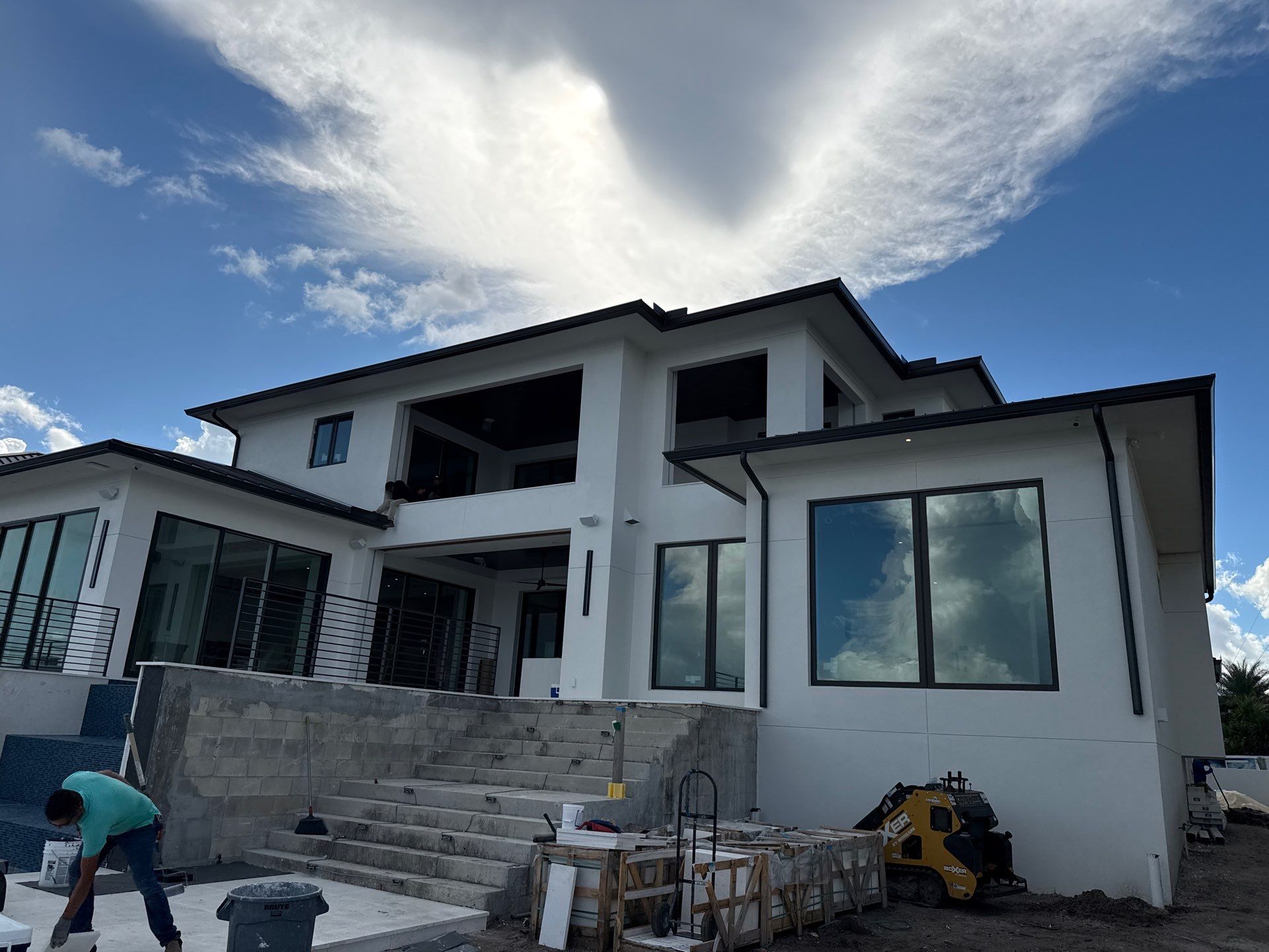 Seamless Aluminum Gutter Installation using black seamless gutters in Sarasota FL by Gutter Professors