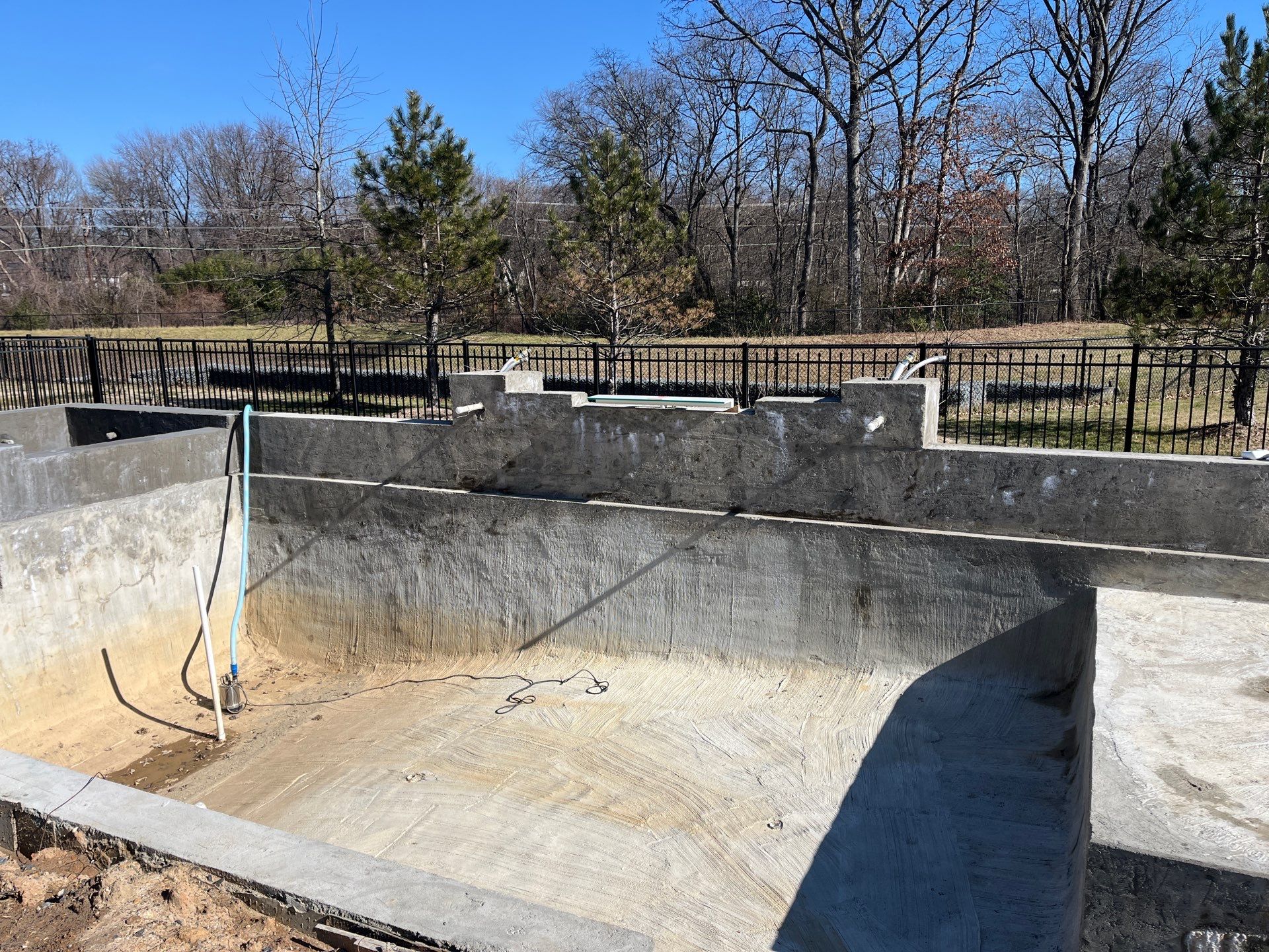 Gunite Pool w/ Spa and Water Features by Elysium Pools