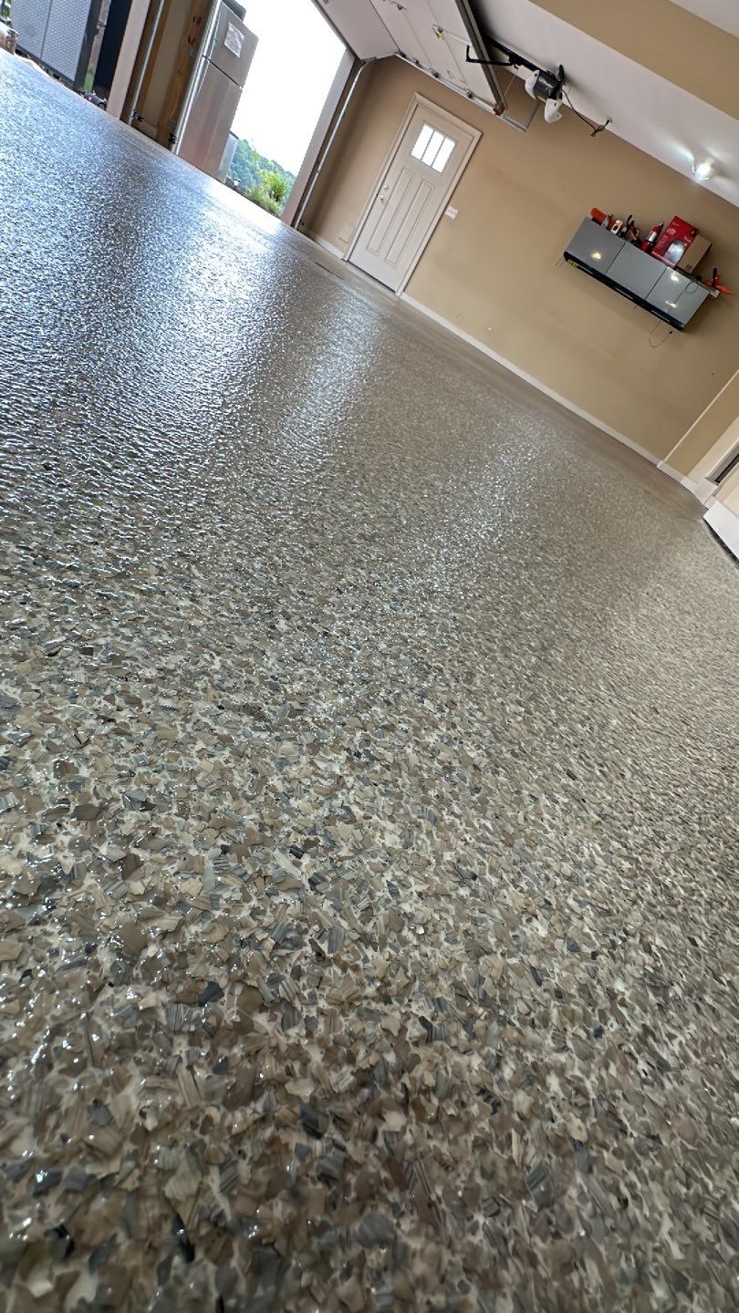 Large Patio + Garage Project in Moon Township by Floors in a Day, Inc