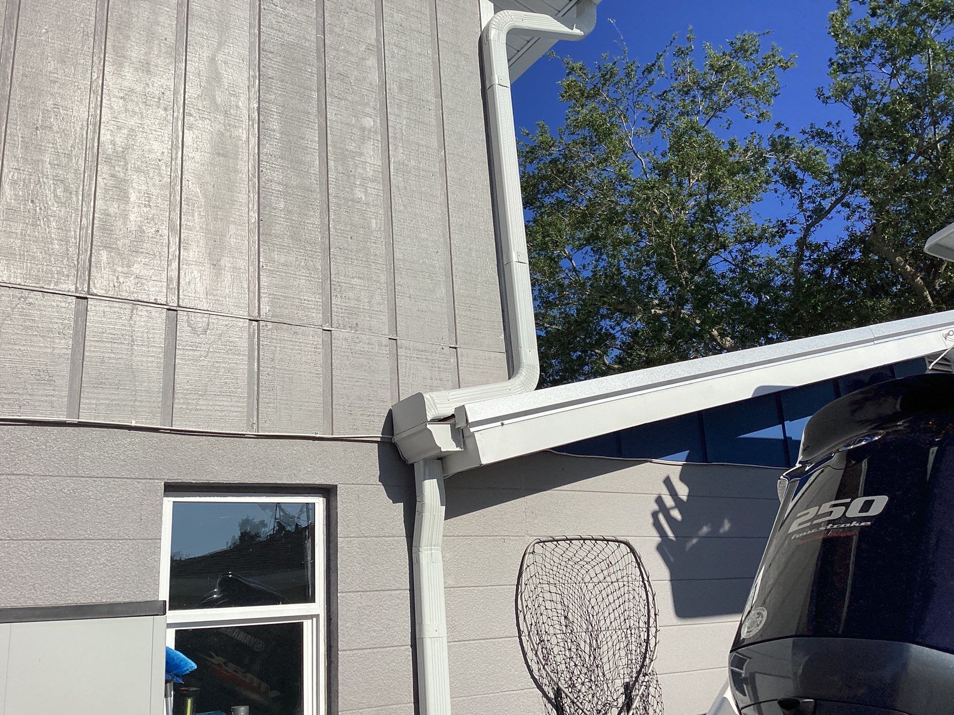 White K Style Seamless Gutters using 3X4 Elbow Downspout in Sarasota FL by Gutter Professors