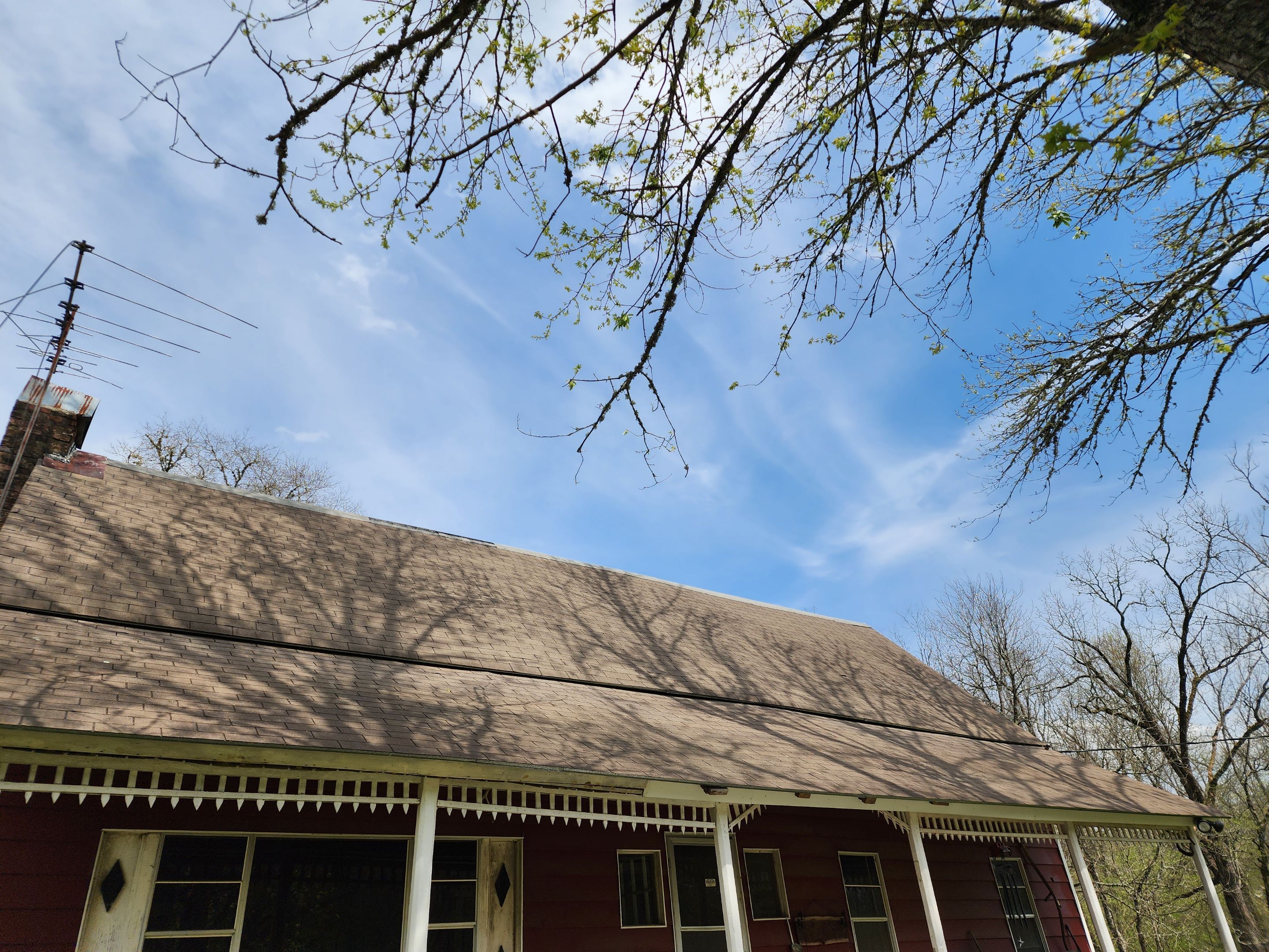 Residential Roofing Installation using 26 Gauge Colored Panels by Hostetler Roofing
