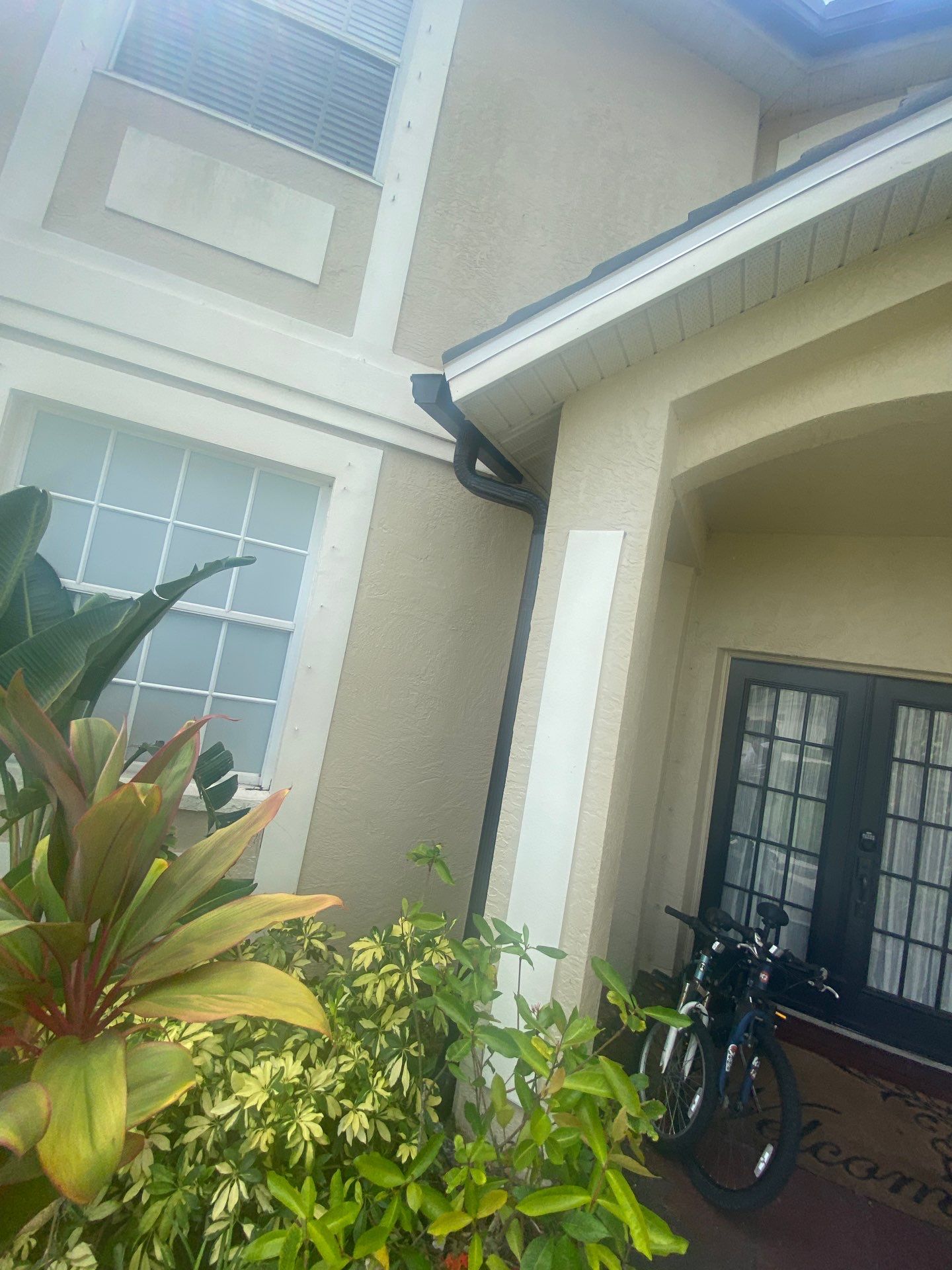 Black Seamless Gutters for Modern Homes in Osprey FL by Gutter Professors