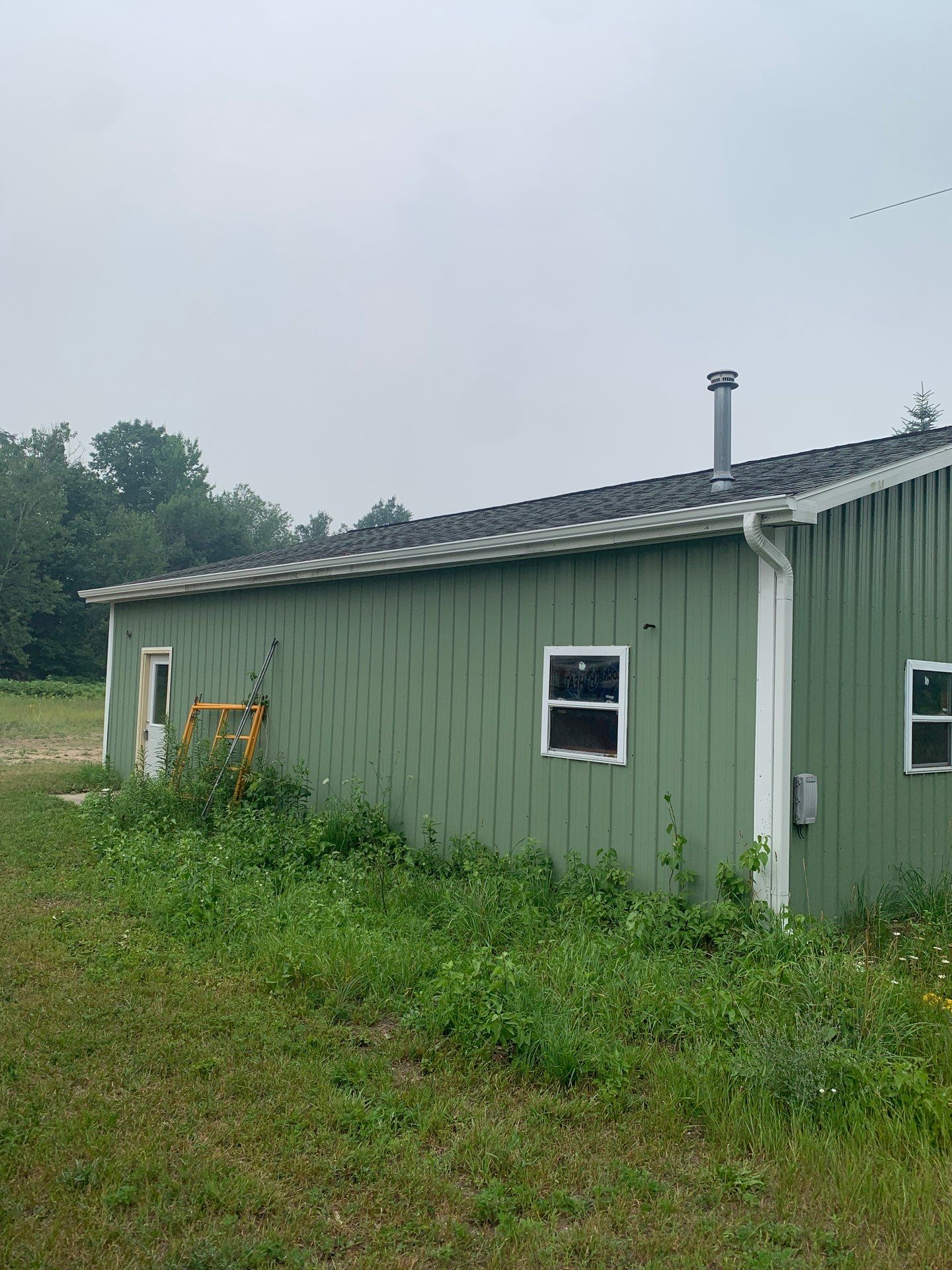 Residential Gutter Installation for House and Outbuilding in Benzonia