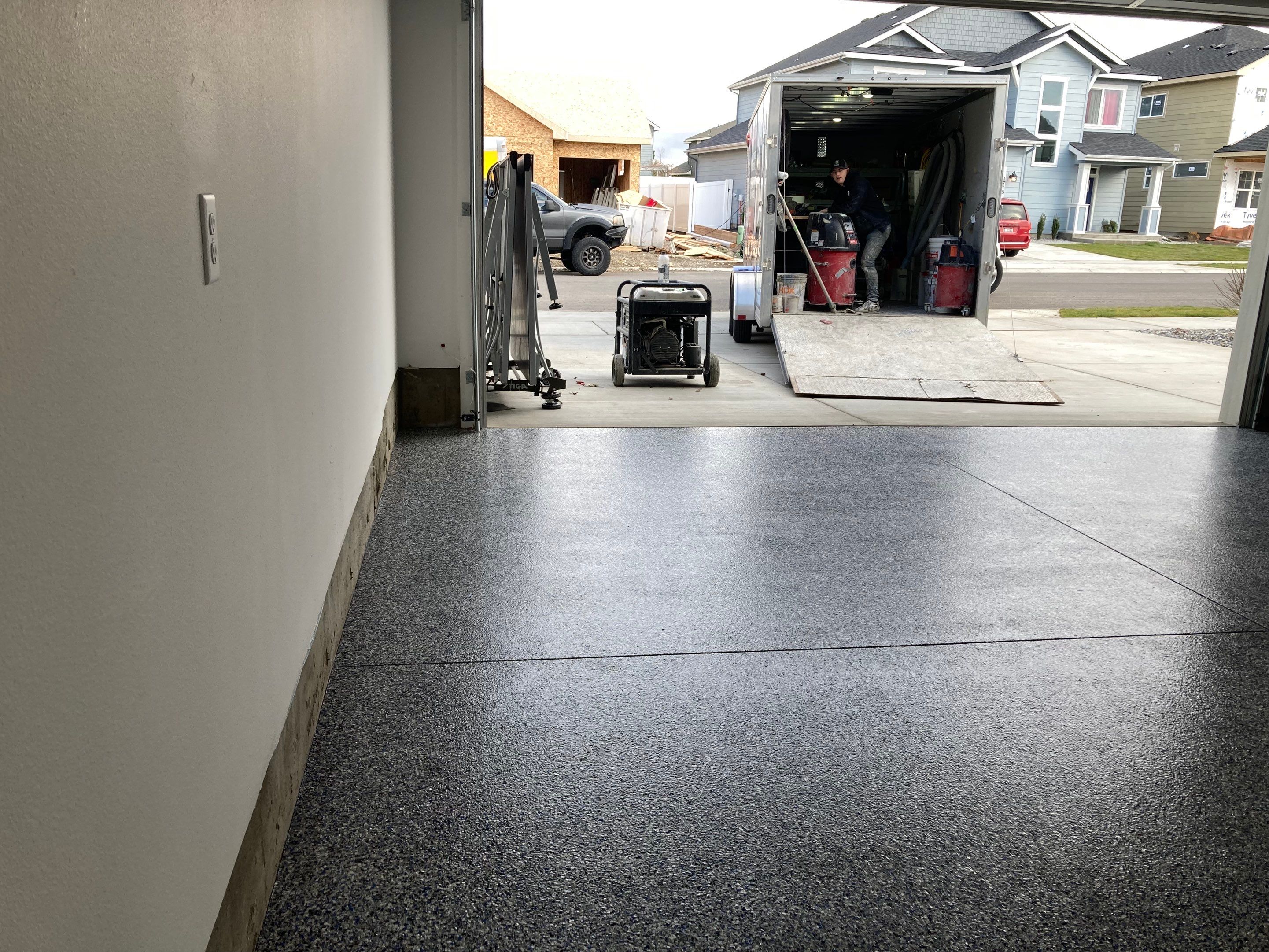 Garage Transformation using Domino with Blue by Croc Coatings, LLC