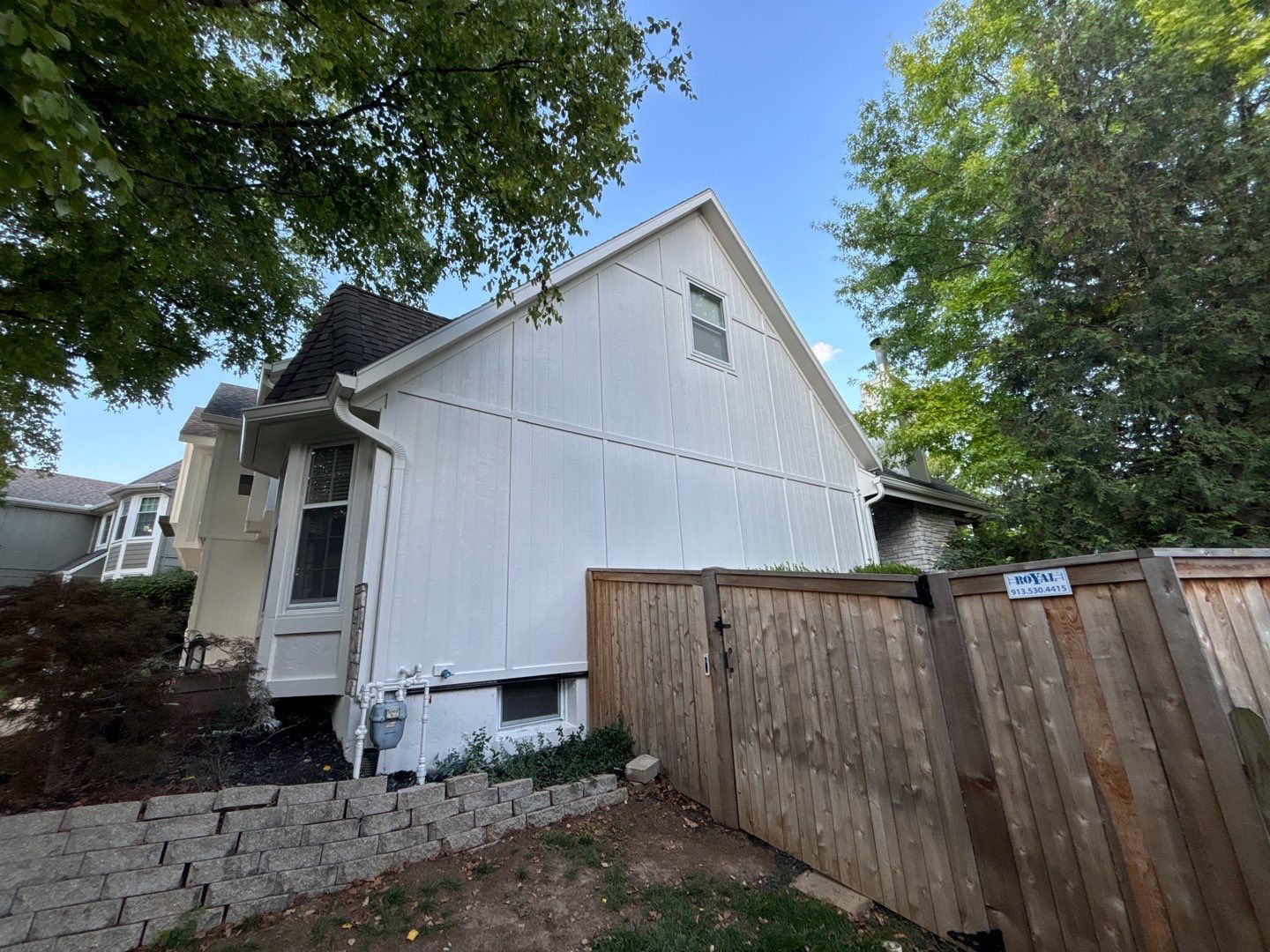 Shoji White Exterior Painting and Comprehensive Wood Rot Repair in Overland Park by Cougar Painting