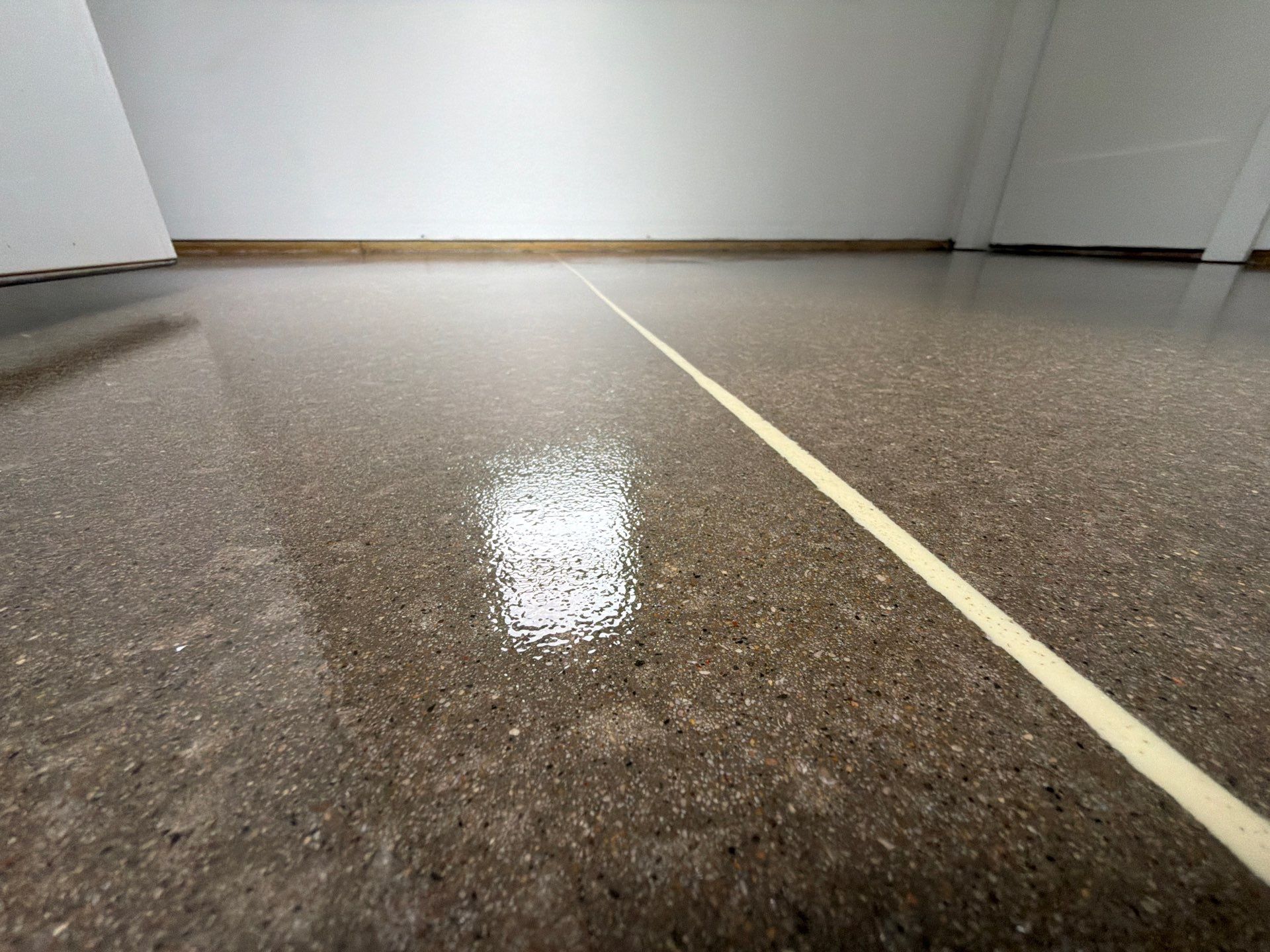 Speckled Epoxy Floor Installation and Concrete Refinishing in Nunica by Gordon Painting