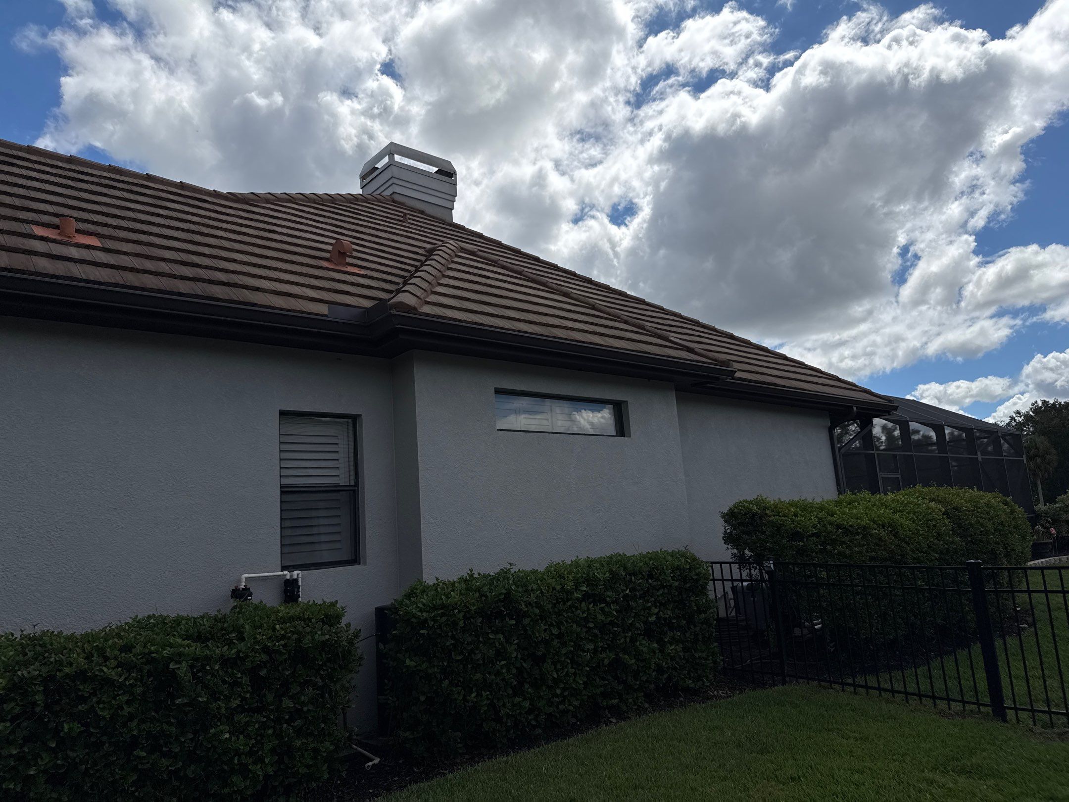 Tile Roof, Paver Pool Deck & Flowerbed Curbing Cleaning | Winding River Bradenton, FL Transformation by Sunshine AquaWash
