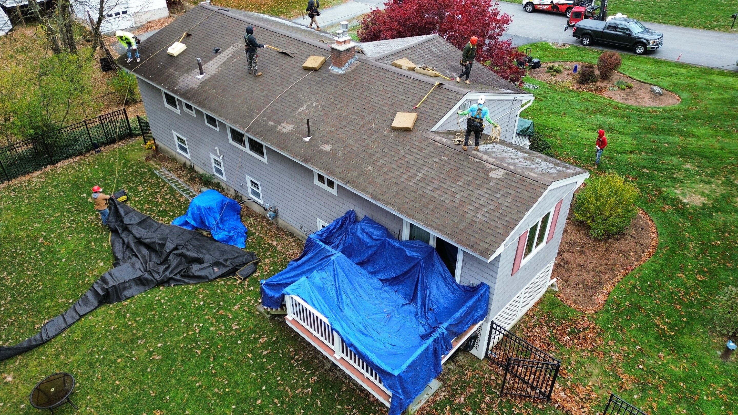 Chelmsford Complete Roof Replacement in Onyx Black with Balanced Ventilation by Mighty Dog Roofing of Greater Middlesex County