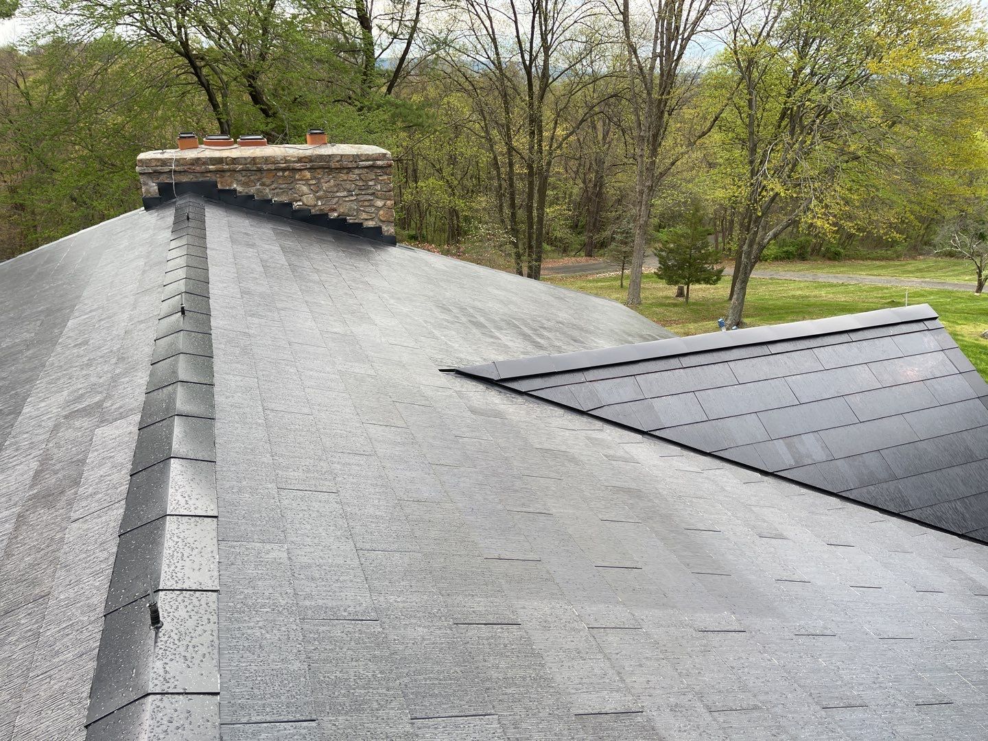 Tesla Solar Roof Replacement by American Home Contractors