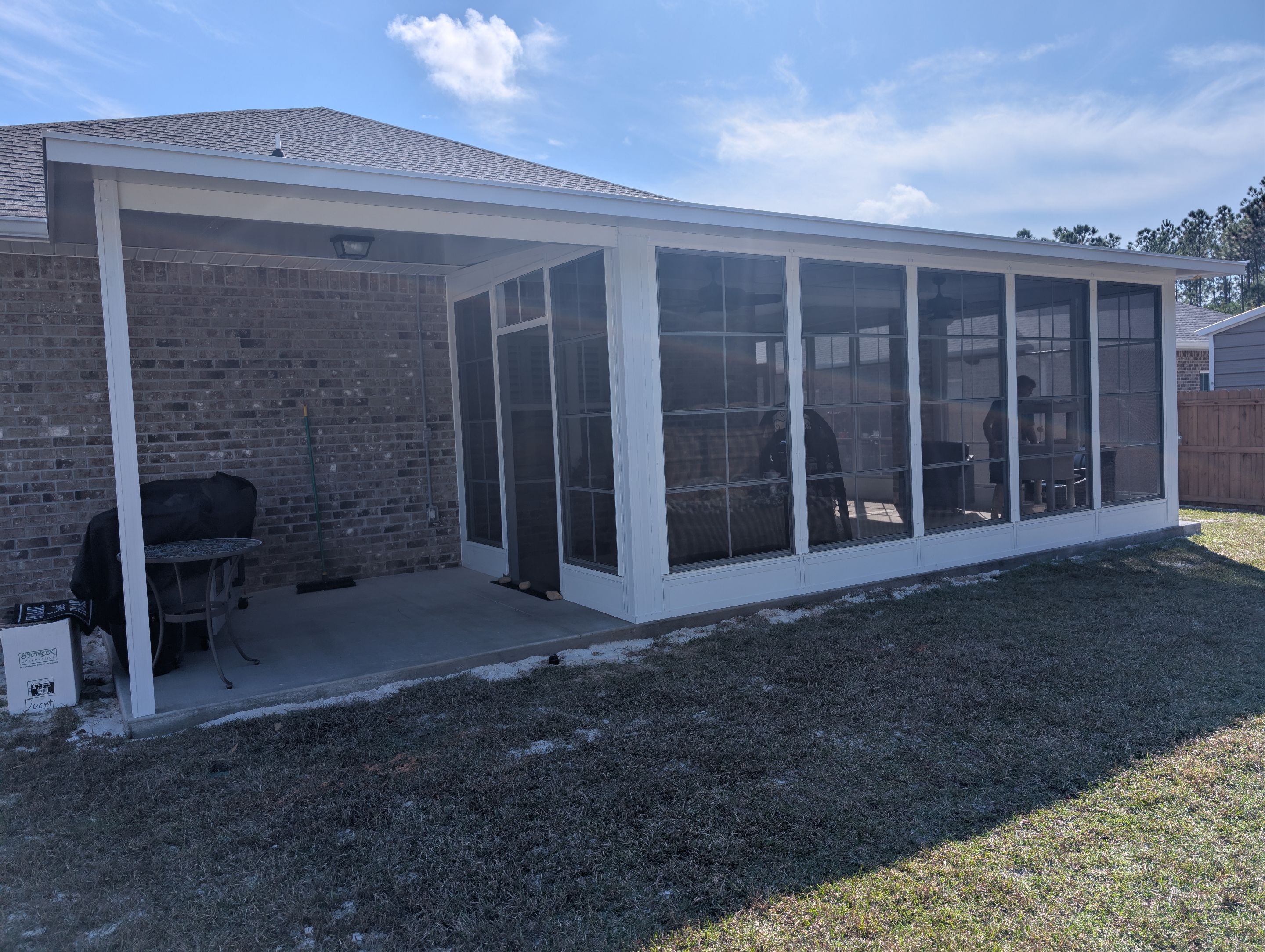 Home addition w/Vinyl 4-Track Windows by Titan Sunrooms