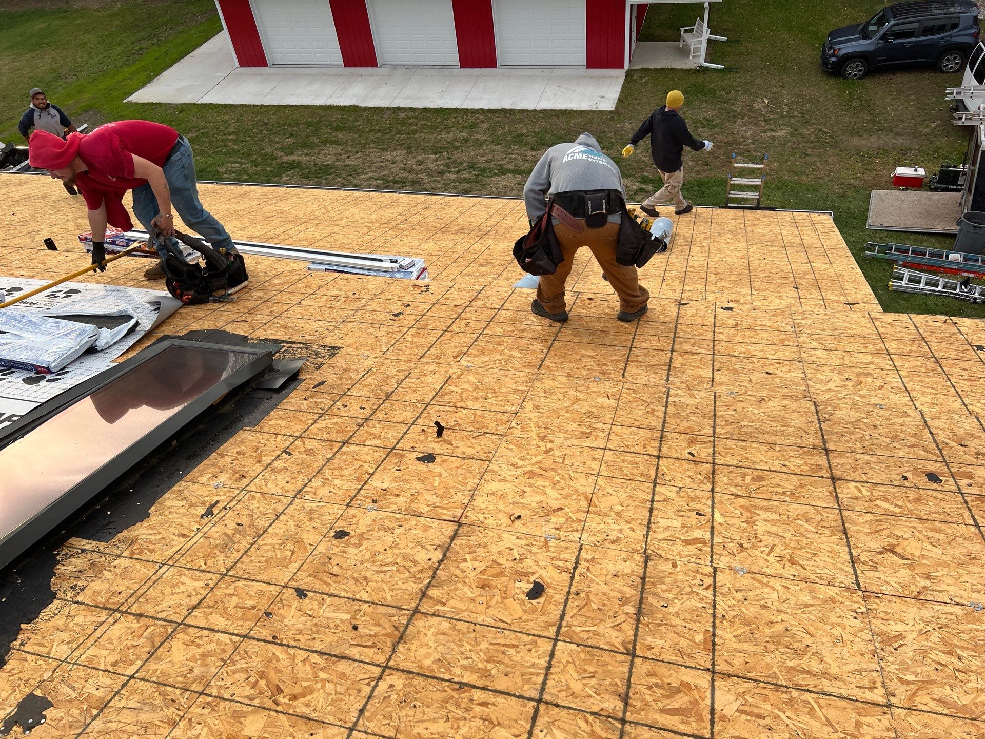 Residential Roofing Replacement with Multiple Skylights in Mason, Michigan by Acme Exteriors