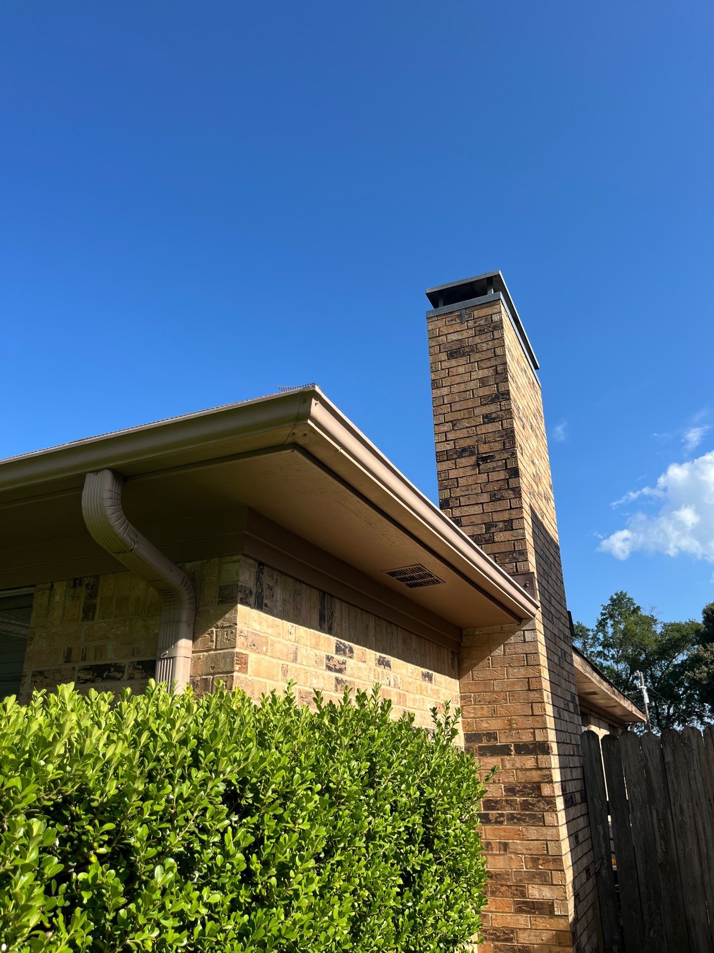 Exterior Painting in Tyler, TX | Eaves, Door & Columns in Elegant Black by Quality Coats Painting