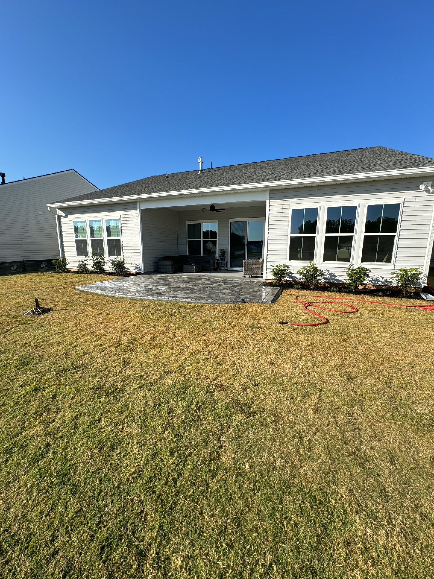 Custom Herringbone Paver Patio and Professional Landscaping in Bluffton by Lowcountry Scapes, LLC