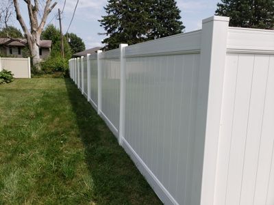 White Vinyl Privacy Fence Installation in Grundy Center