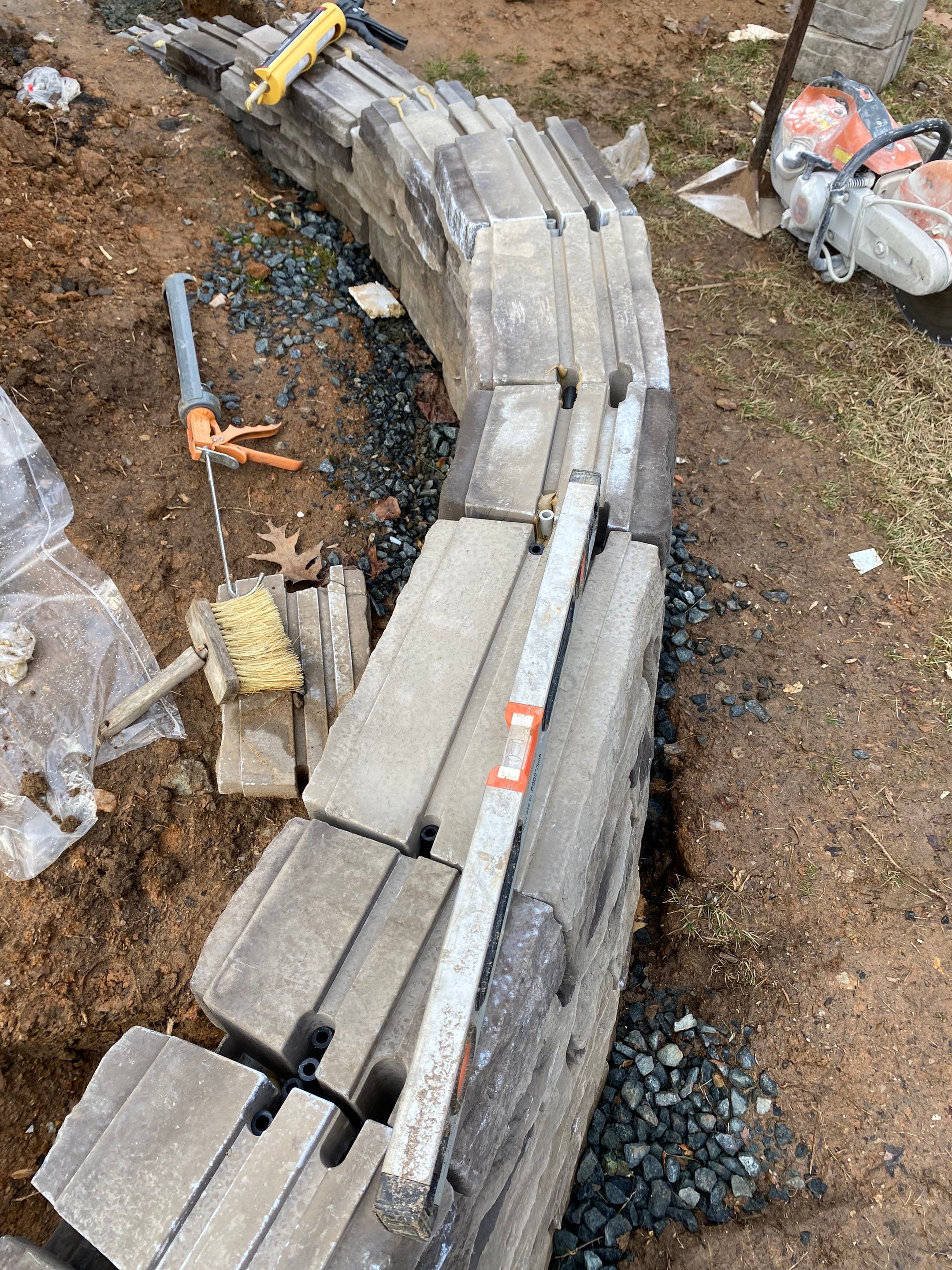 Retaining wall, walkway, small patio and landscape install by The Smet Companies, LLC