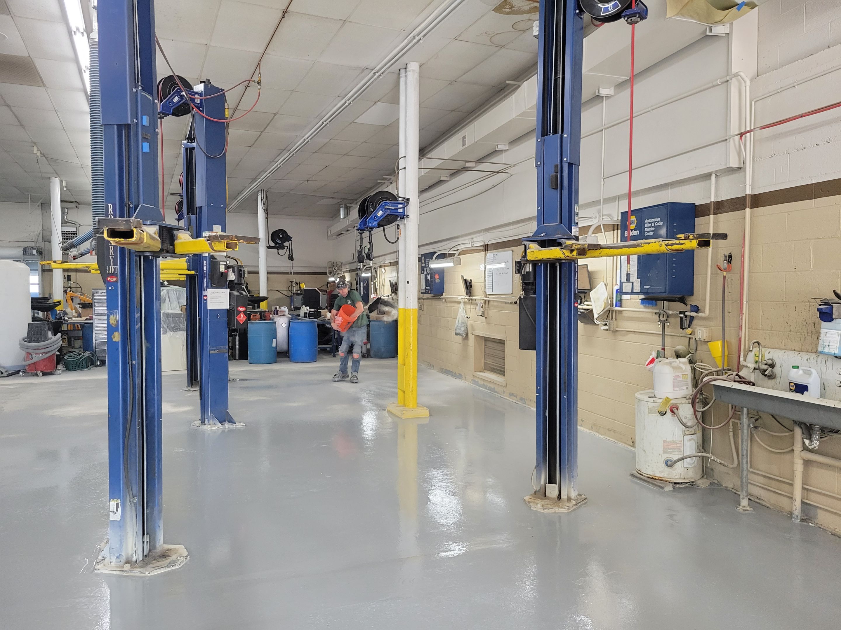 Commercial Floor Transformation using Penntek Shop Floor System by Croc Coatings, LLC