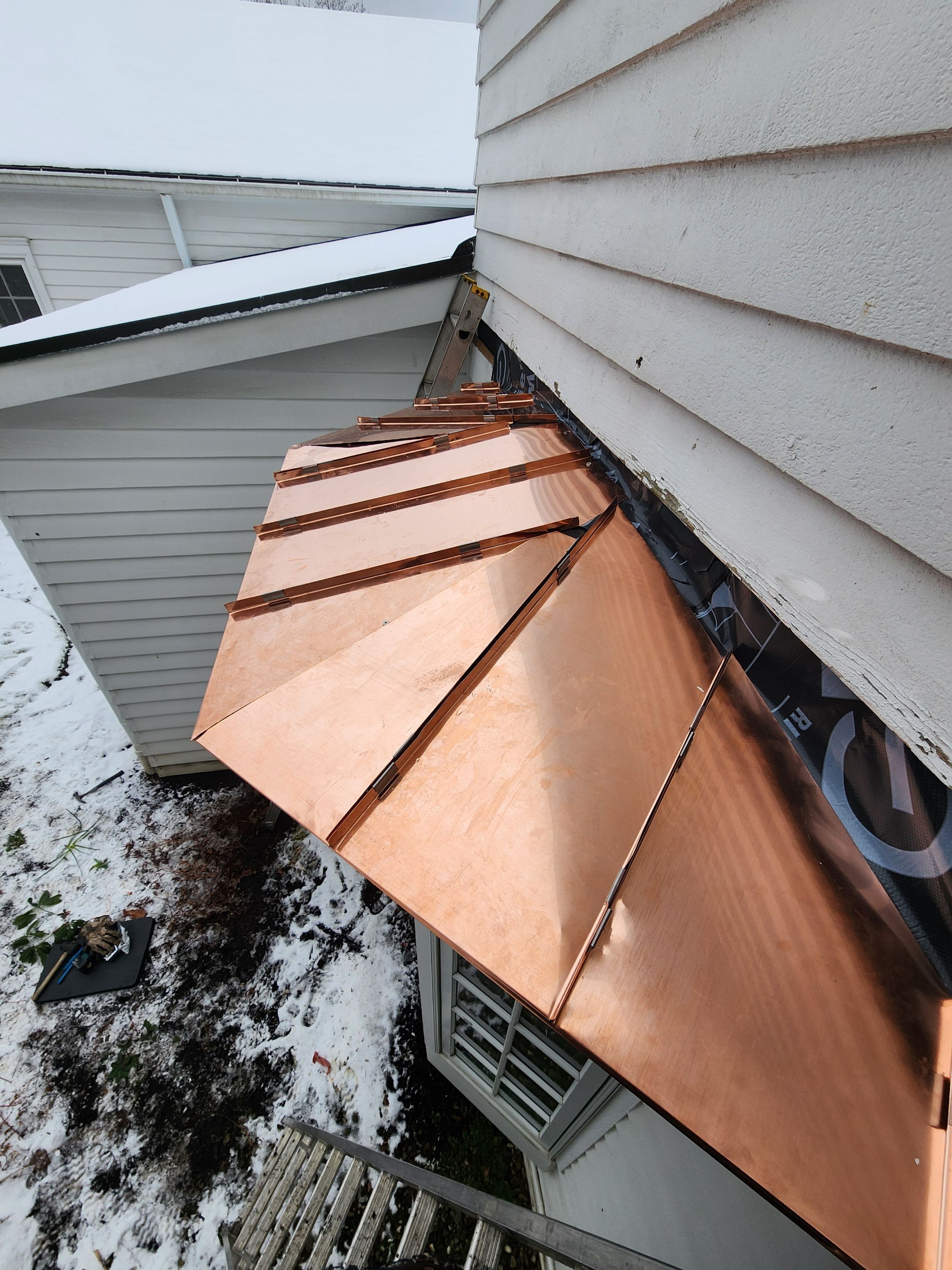 Copper Roof using Copper by Absolute Roofing and Construction
