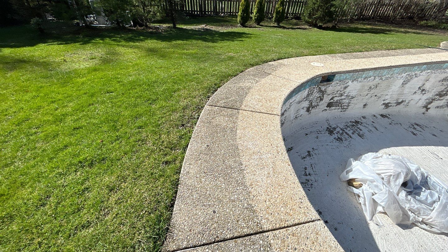 Aggregate Clean and seal using low gloss sealer by Northern Power Washing LLC.