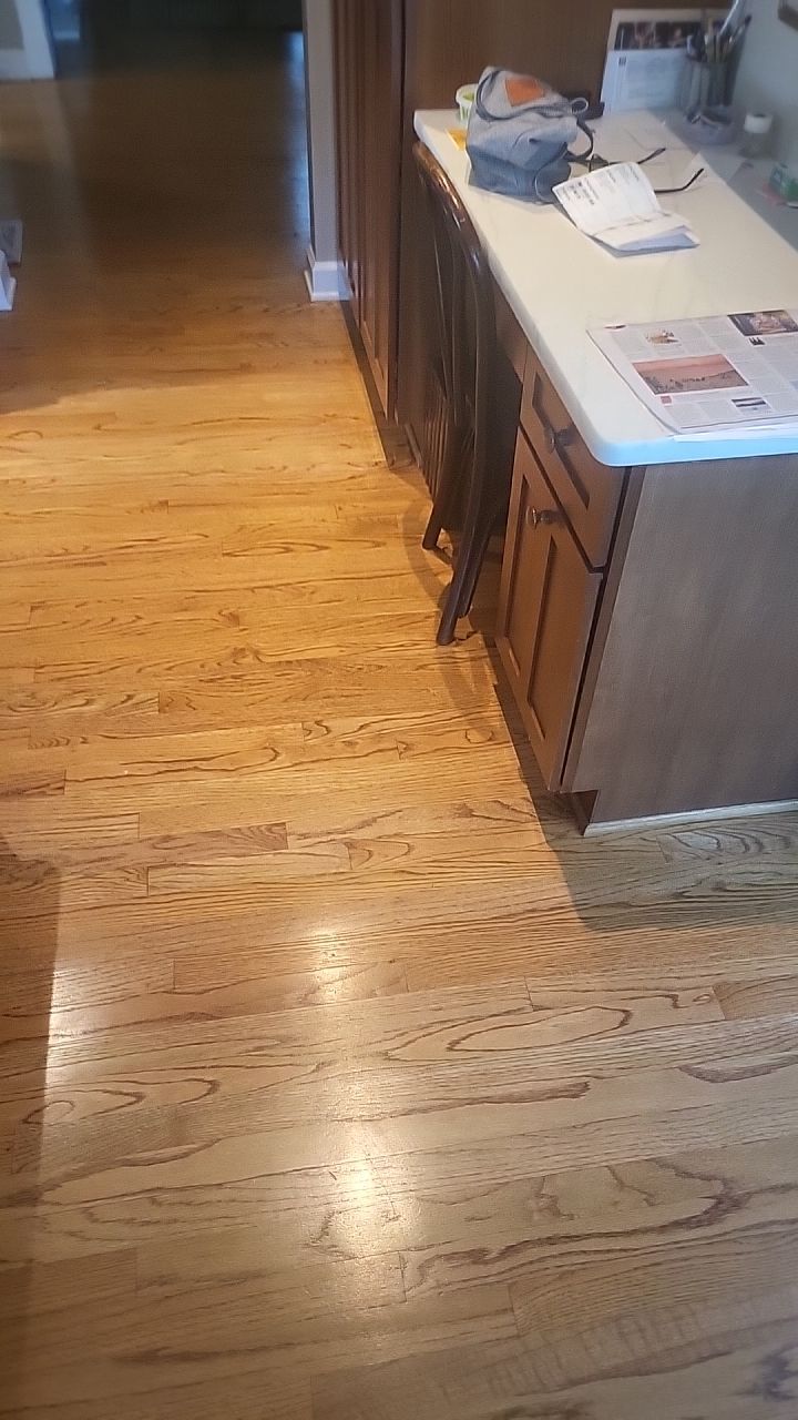 Ann Arbor Elegance: Red Oak and Walnut Living Room Masterpiece by Ann Arbor Hardwoods