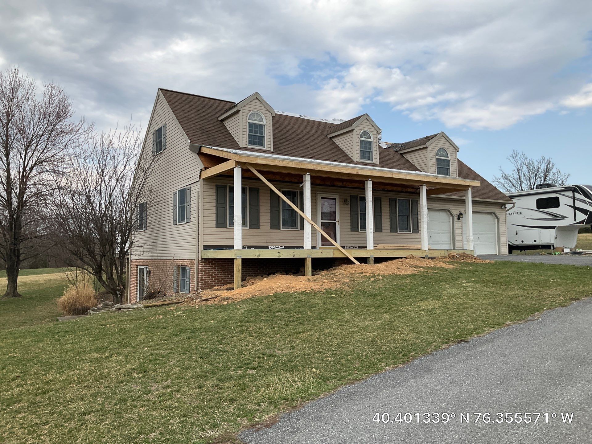 Custom Porch Roof Addition and Siding Renovation in Myerstown, PA by Esh Builders